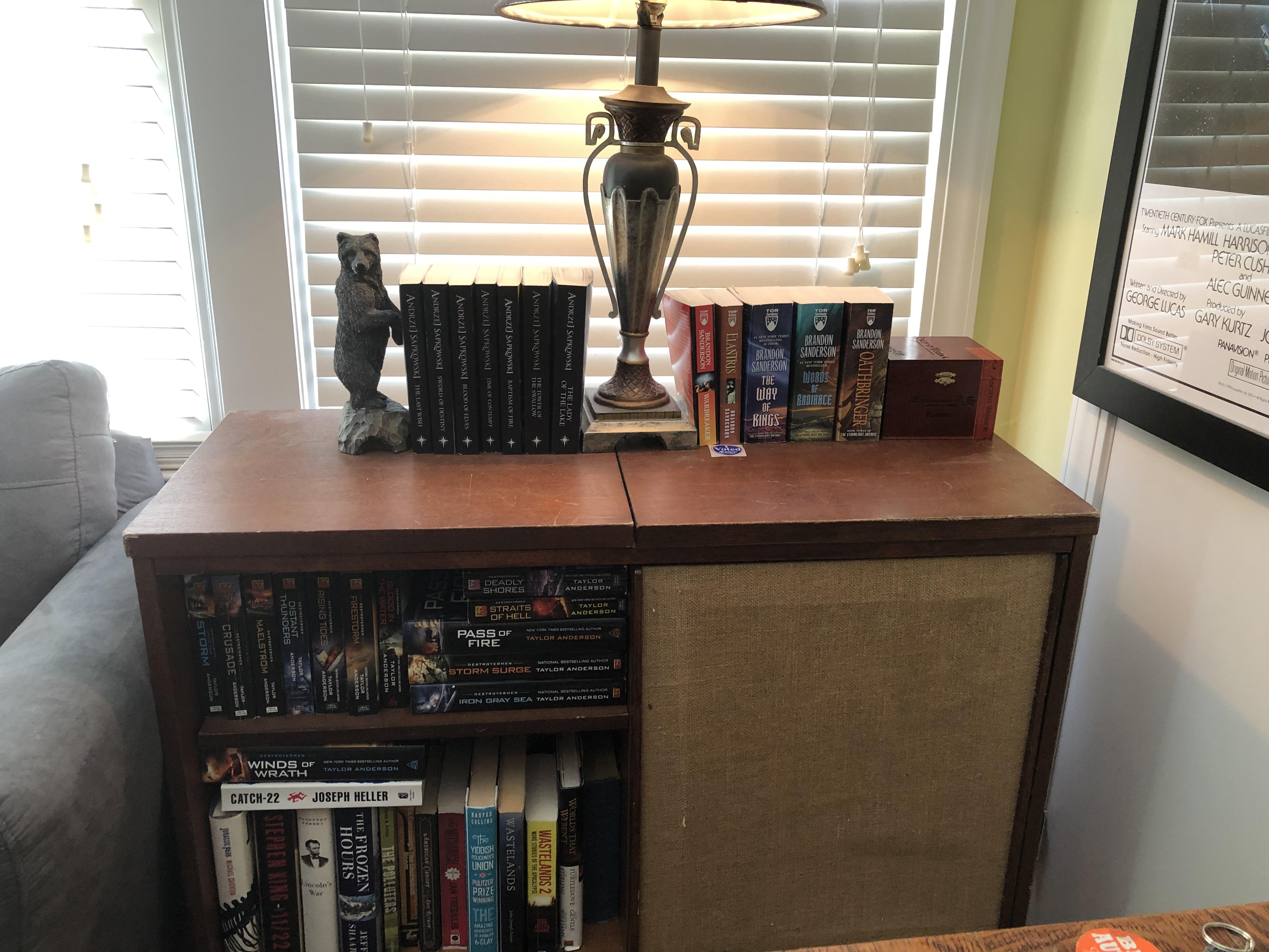 One of my bookshelves is a repurposed record player r/bookshelf