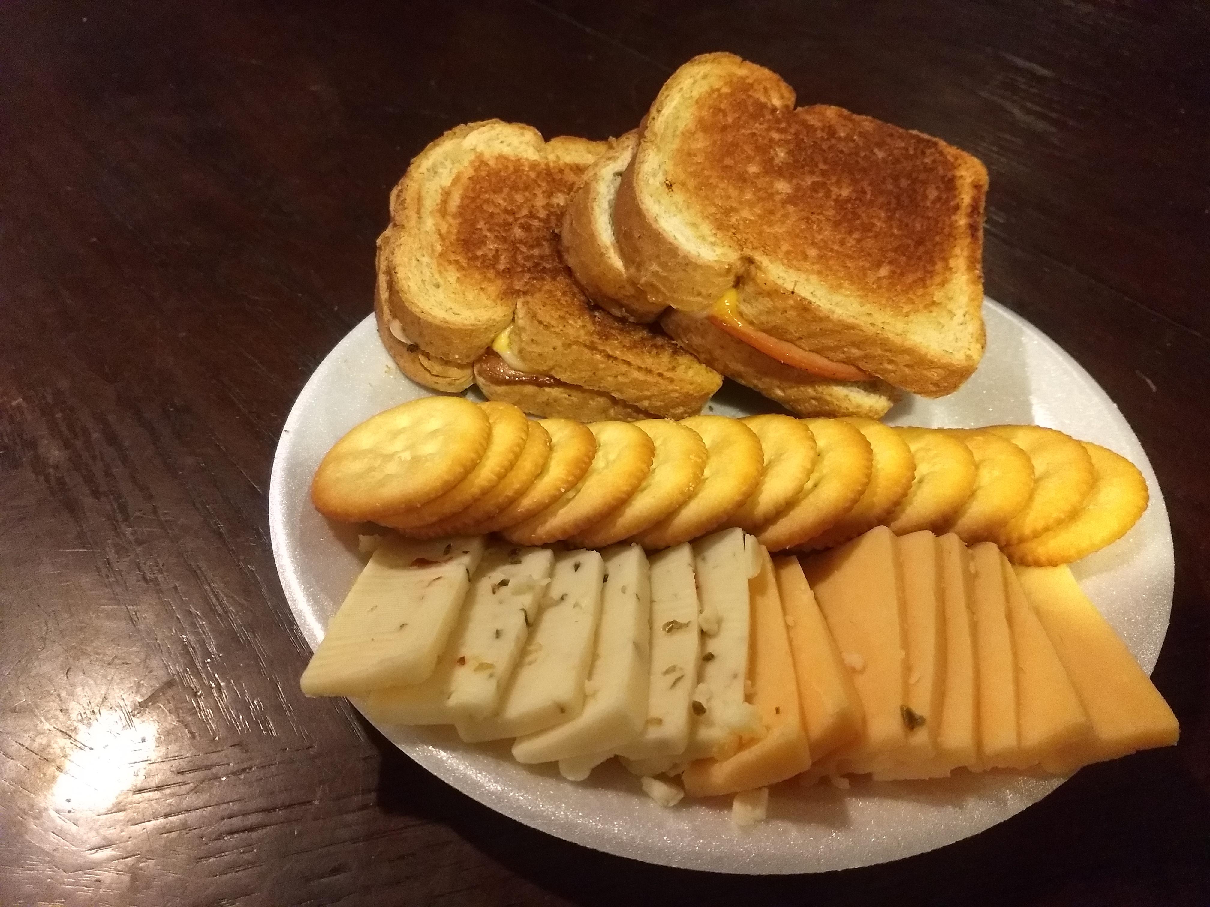 Grilled bologna and cheese sandwiches with cheese and crackers r