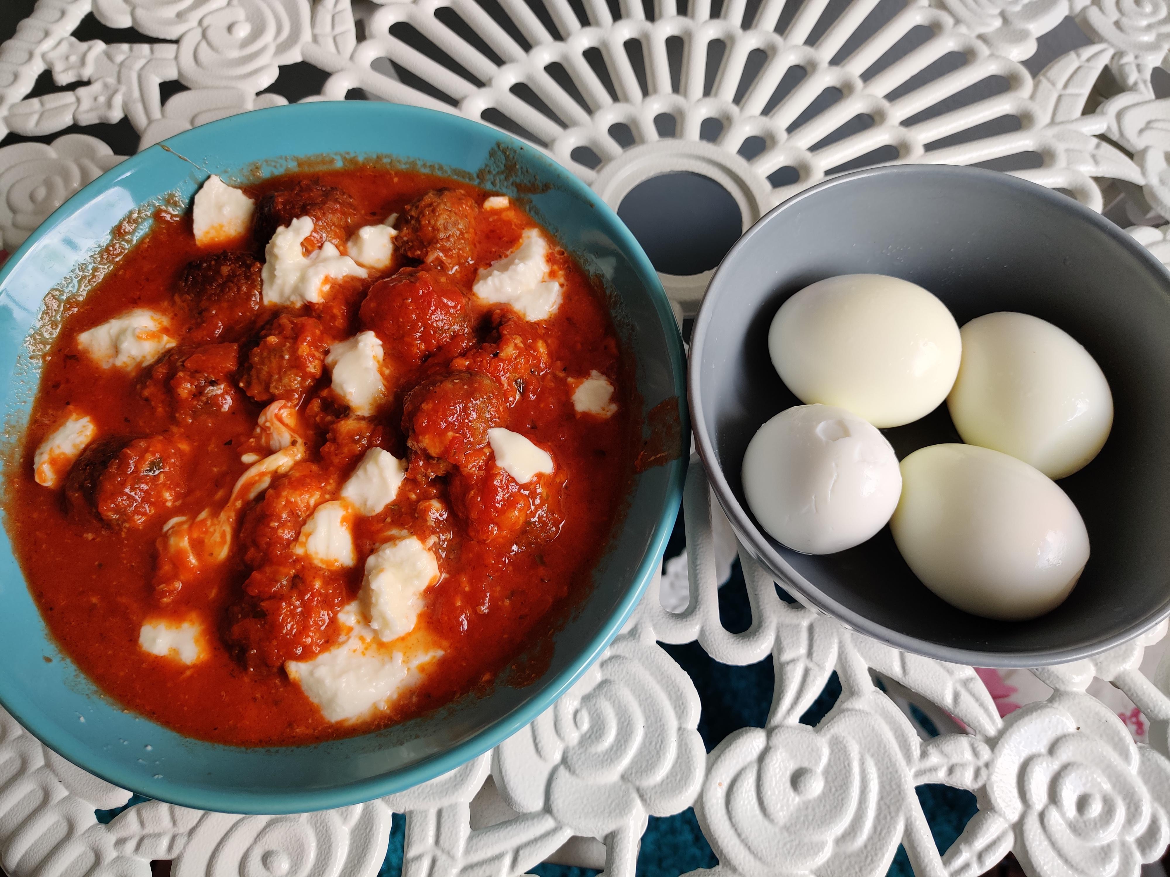 IKEA meatballs, tomato and basil sauce sauce, mozzarella, and 4 boiled
