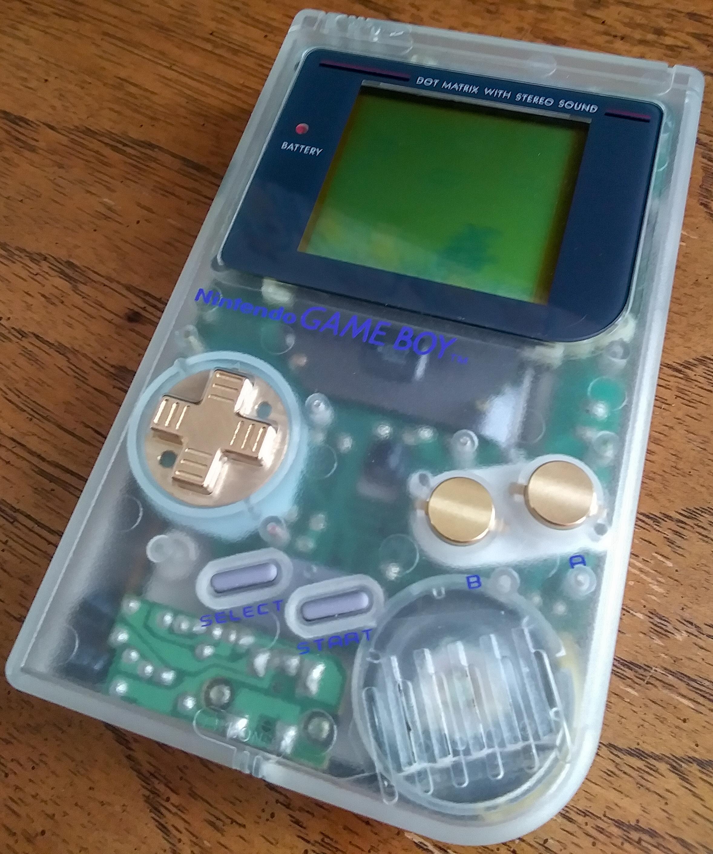 Just finished my first upgrade. Clear body and brass buttons and 86'd