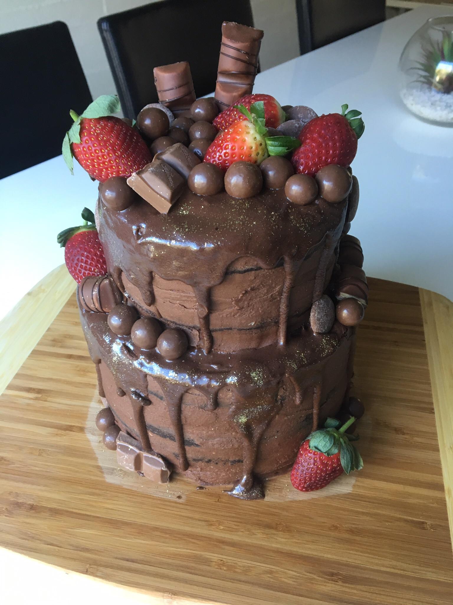I made a chocolate mud cake with a chocolate ganache filling. r/Baking