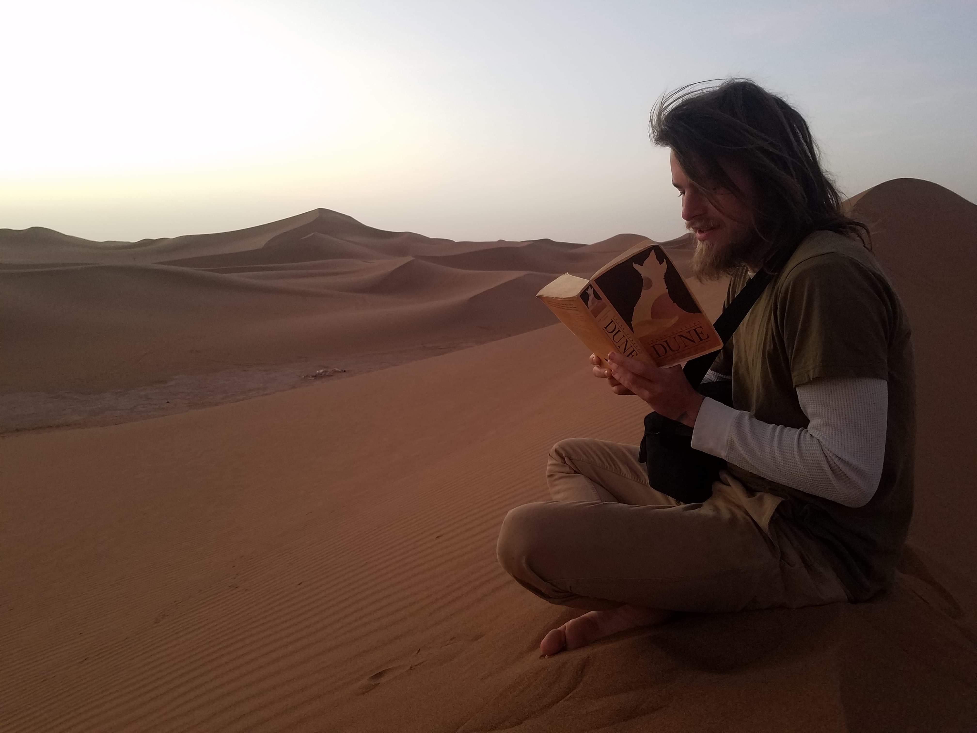 My buddy just started reading Dune on a dune dune
