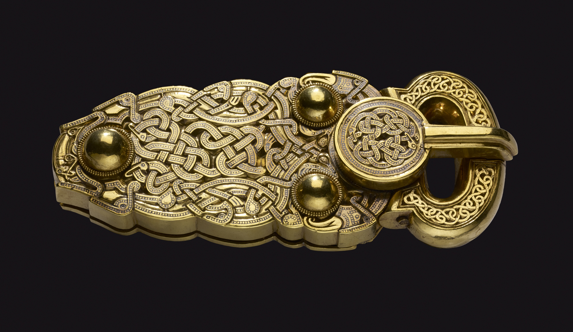 The Sutton Hoo gold belt buckle, one of the greatest achievements of