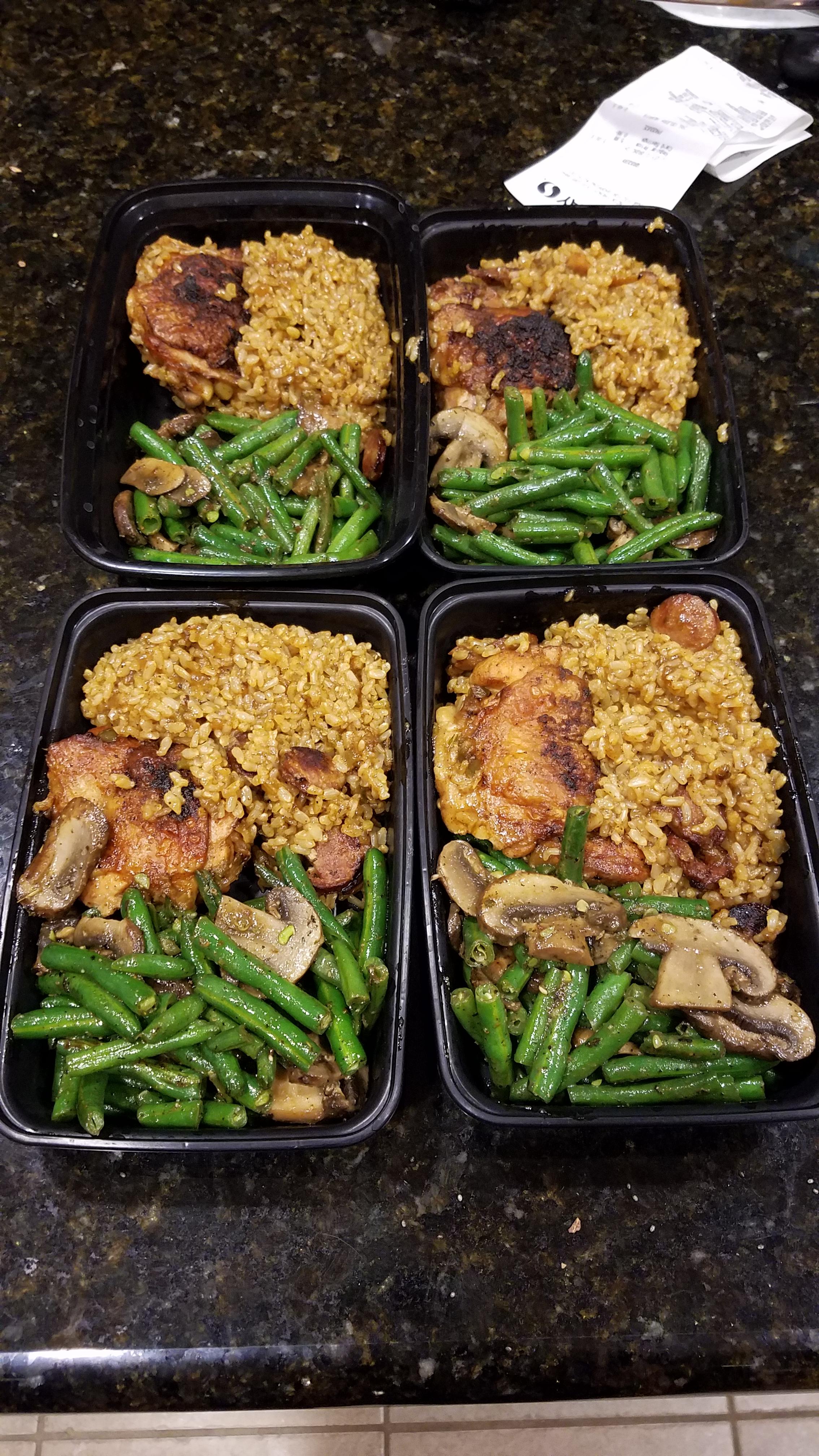 Spicy chicken thighs with dirty rice and sauteed green beans and