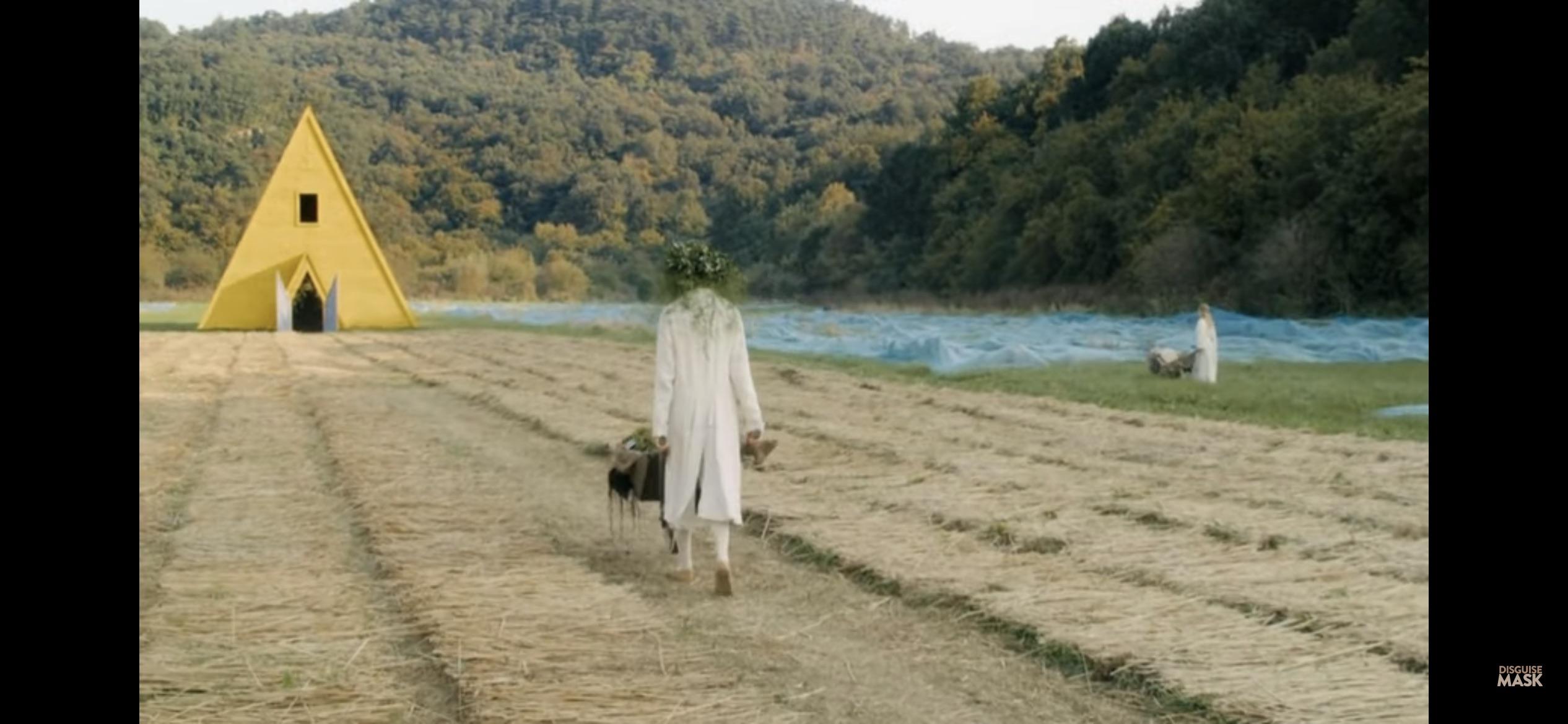 In this scene there are giant blue tarps covering the ground, there are