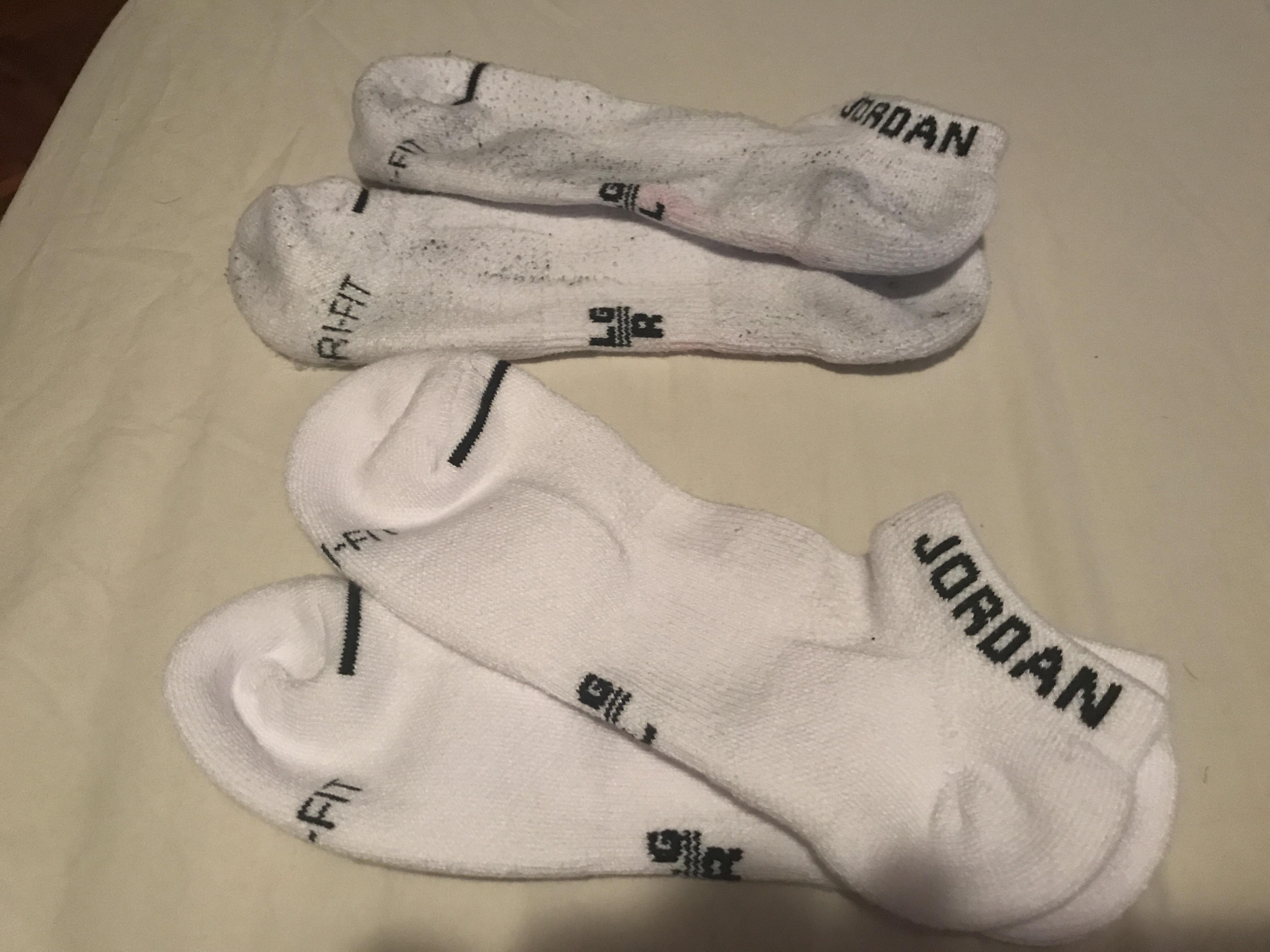 Jordan socks after 1 wear and quick machine wash v. new unused pair