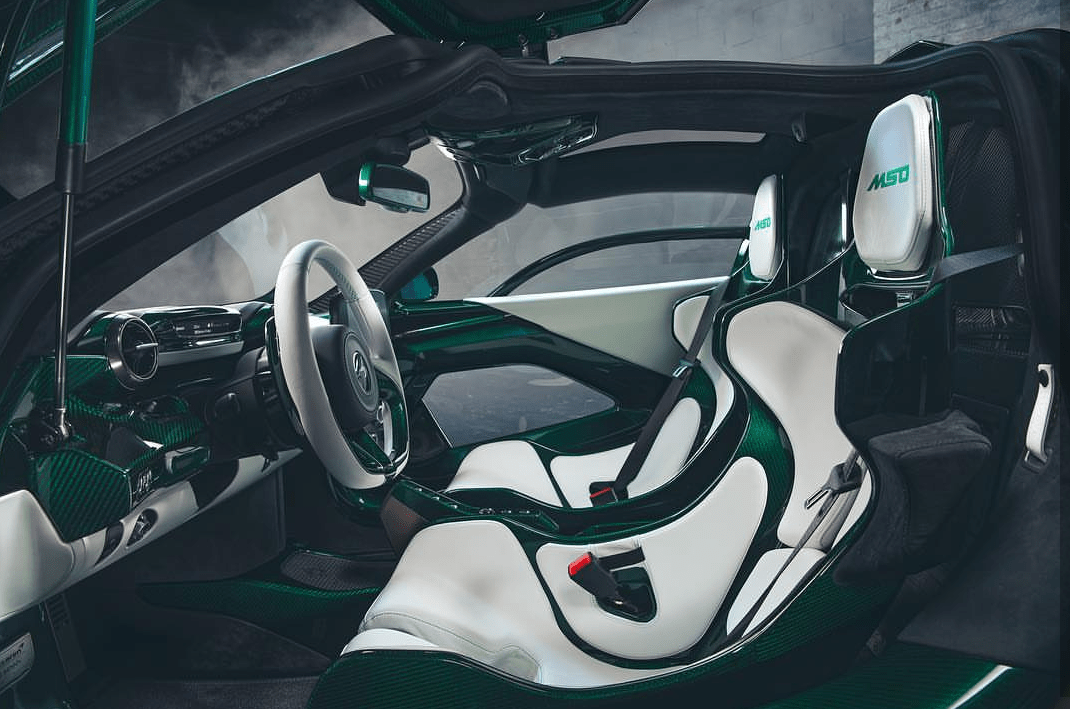 The "Fux Green" tinted carbon glass finish from McLaren. In short Wow