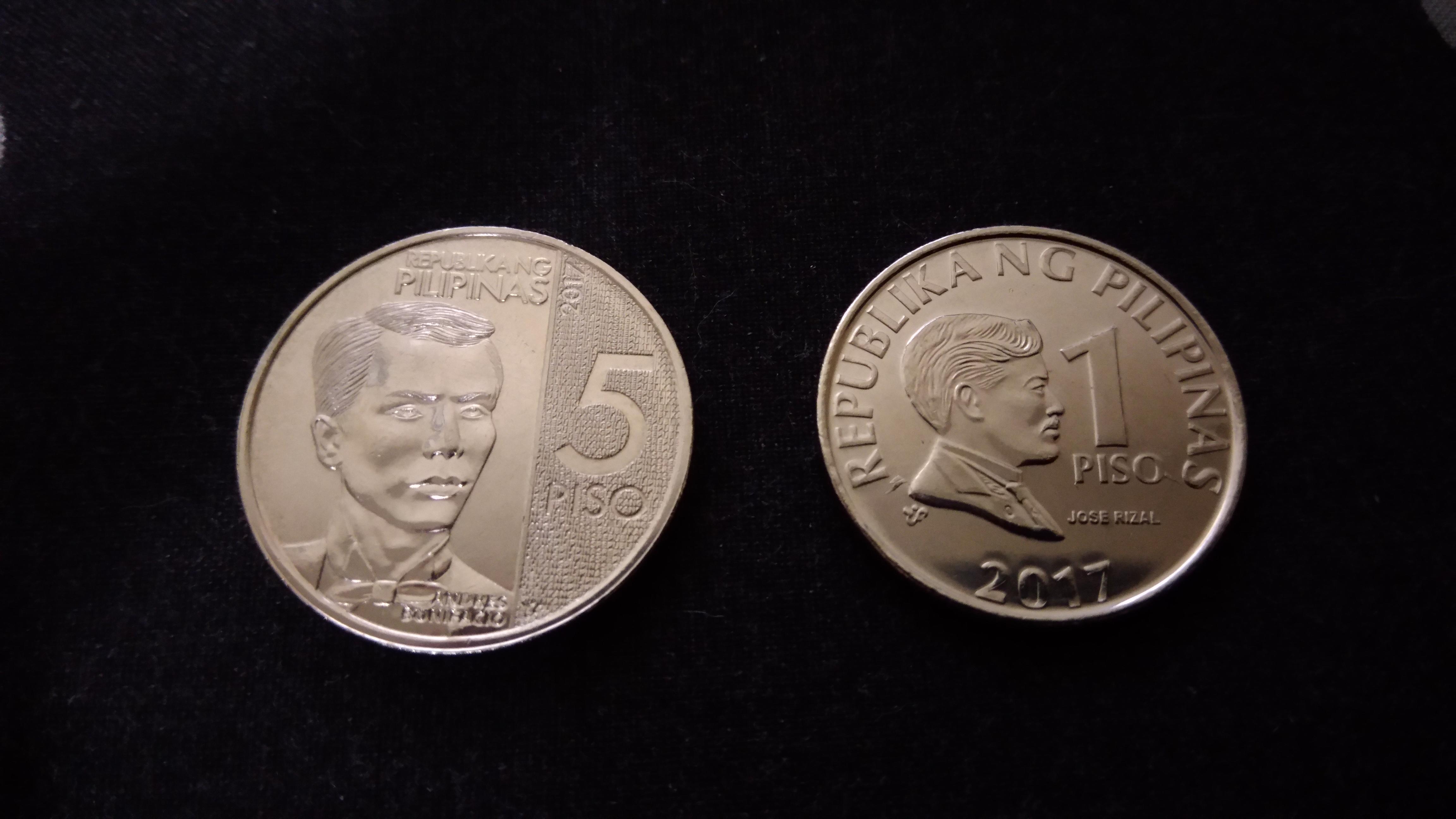 The new Philippine 5 peso coin is too similar to the 1 peso coin. r
