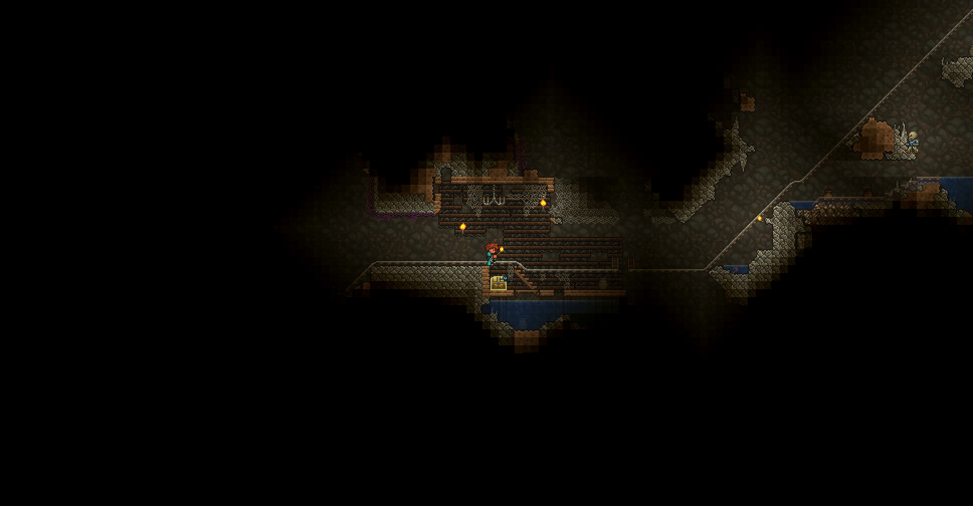 Mine cart rail destroys most of this underground house r/Terraria