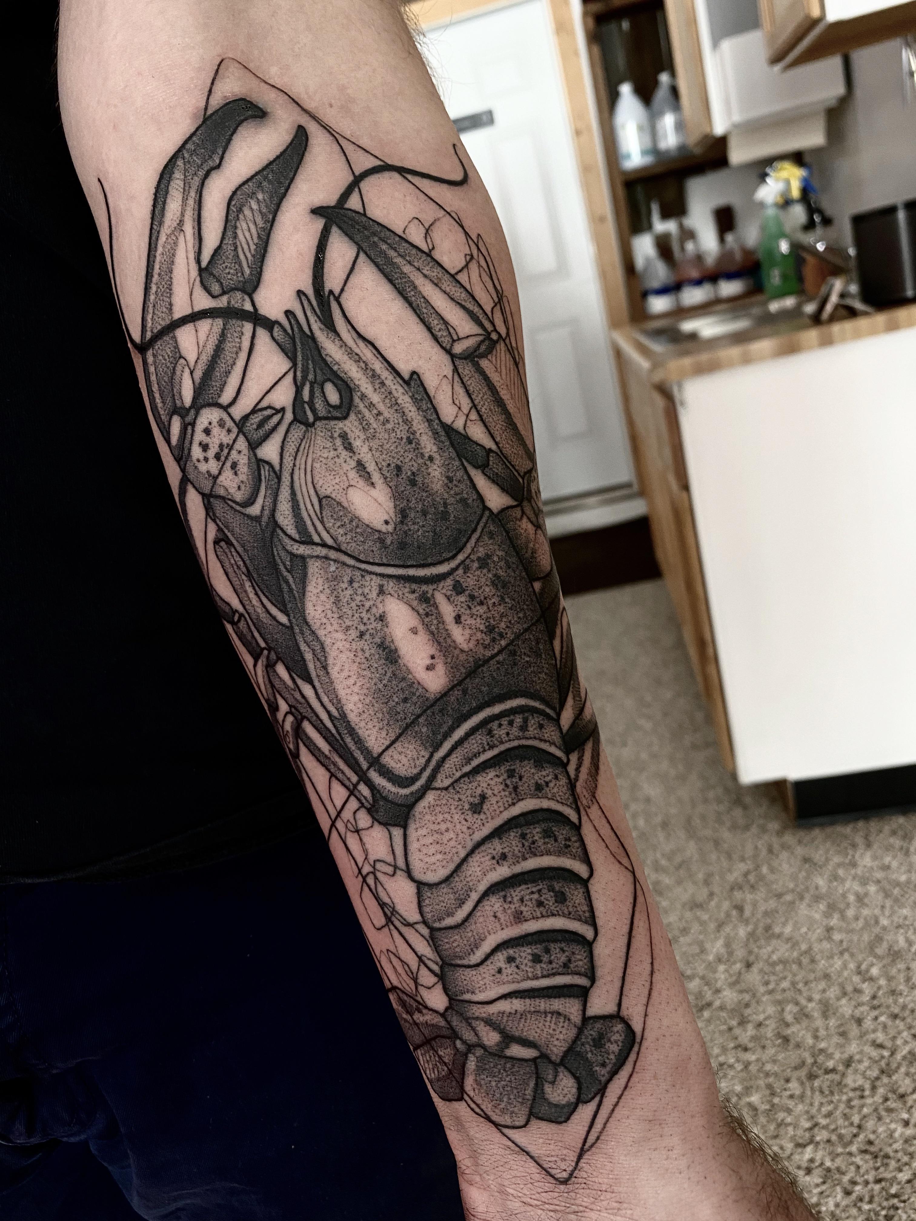Blackwork lobster tattoo done by Max LaCroix at Akara Arts in Milwaukee