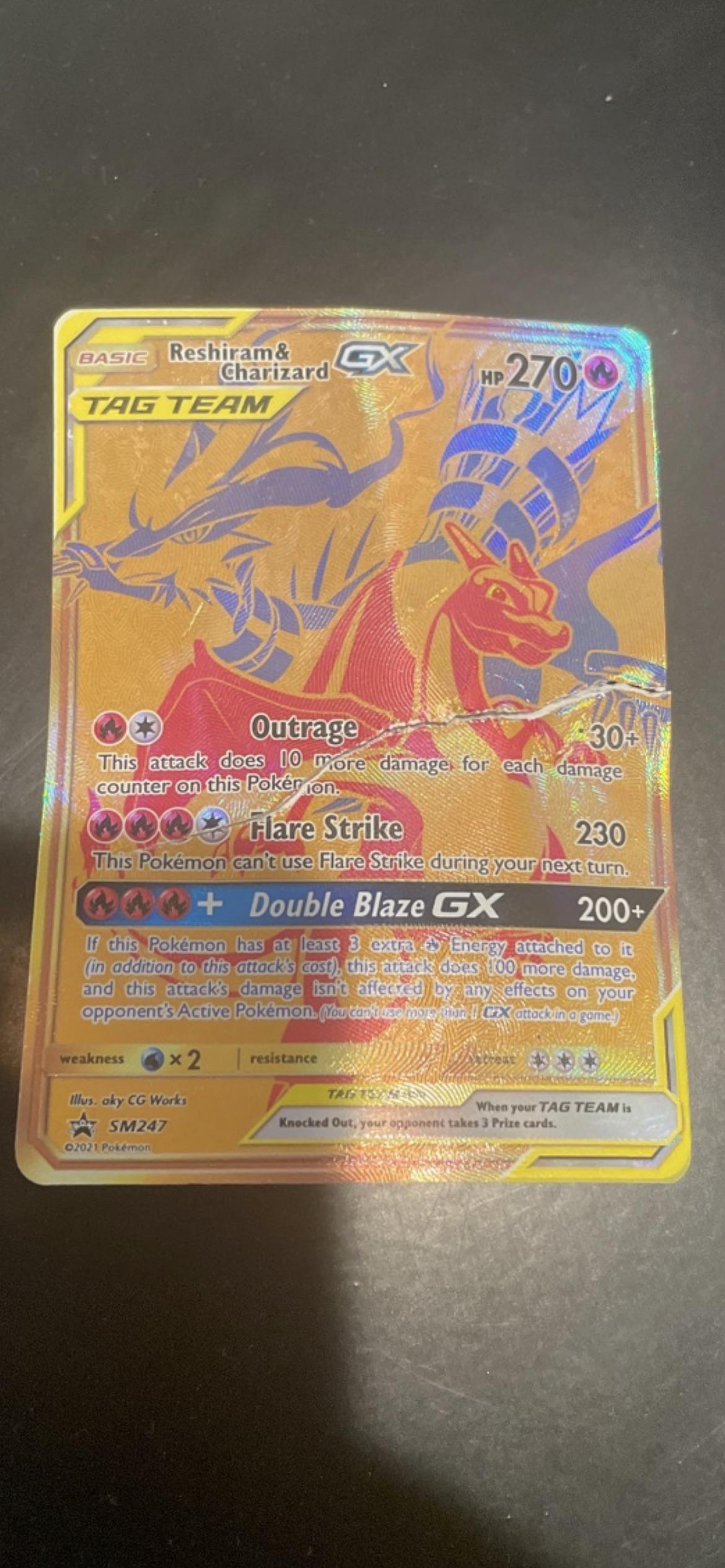 Fake or Real? I got this Reshiram Charizard from ebay. How can i know