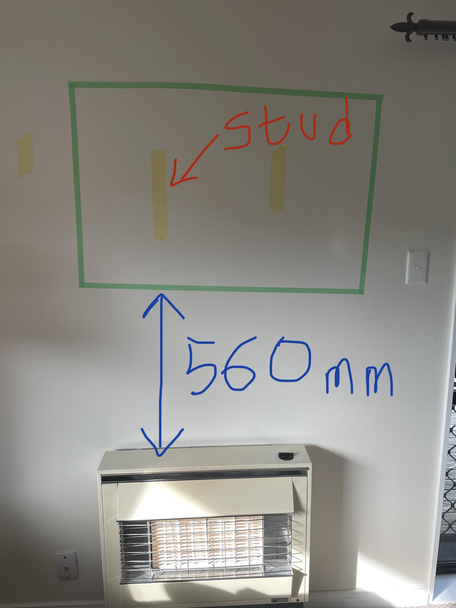 What is the clearance required between the top of a gas fireplace and
