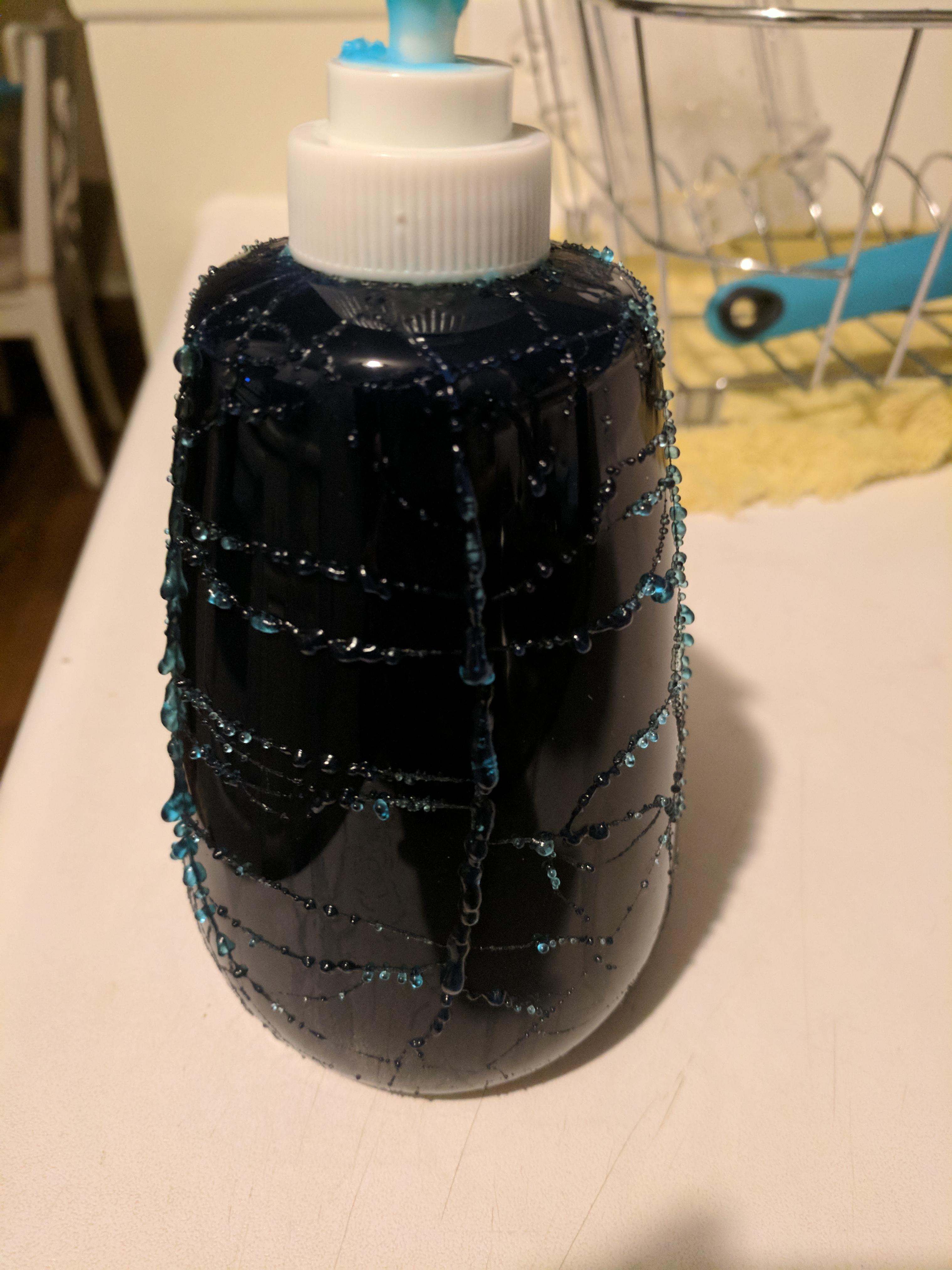 Dish soap slowly leaking from cracks all over dispenser r