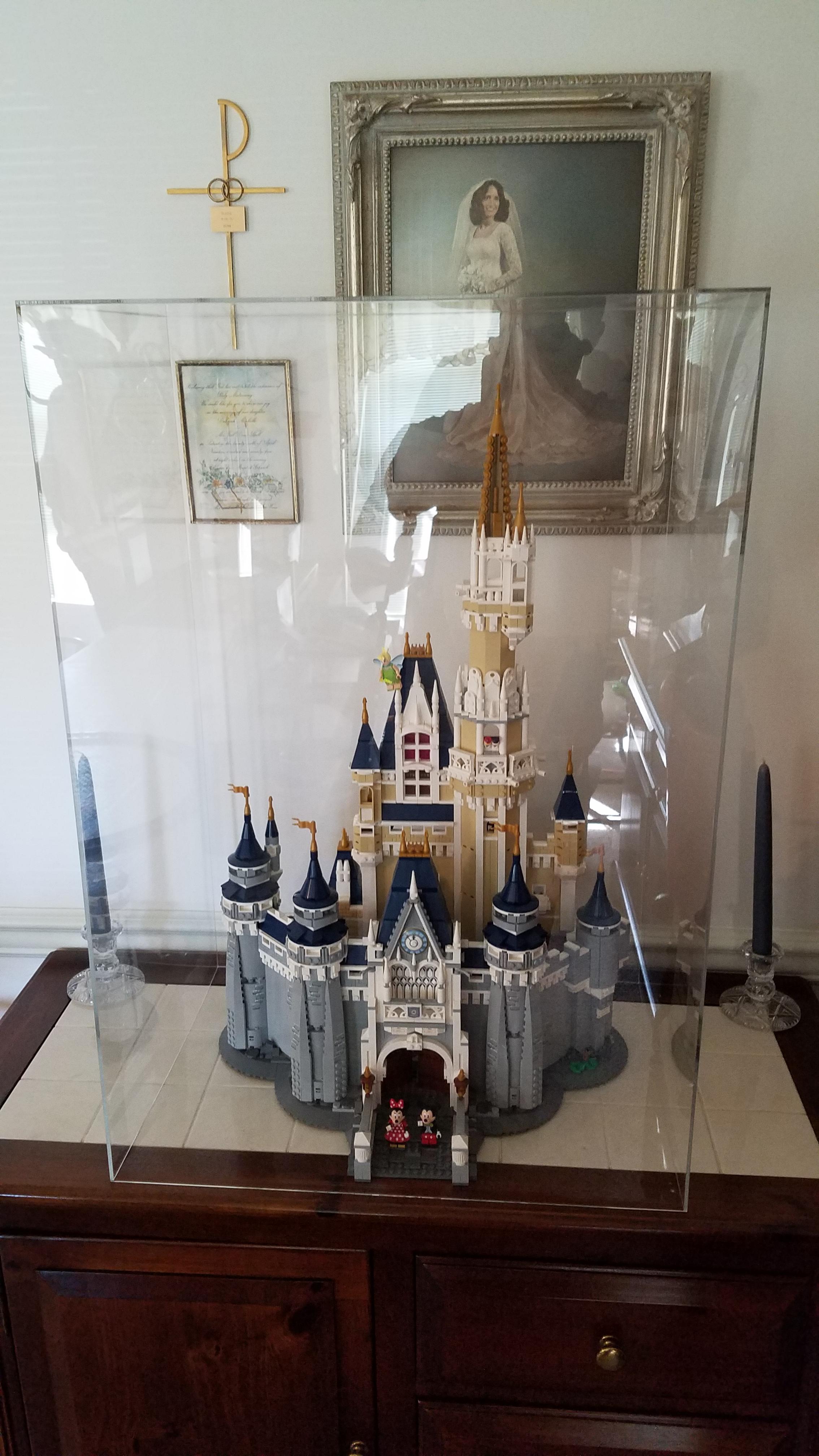 My mom has a custom acrylic display case for her Disney Castle r/lego