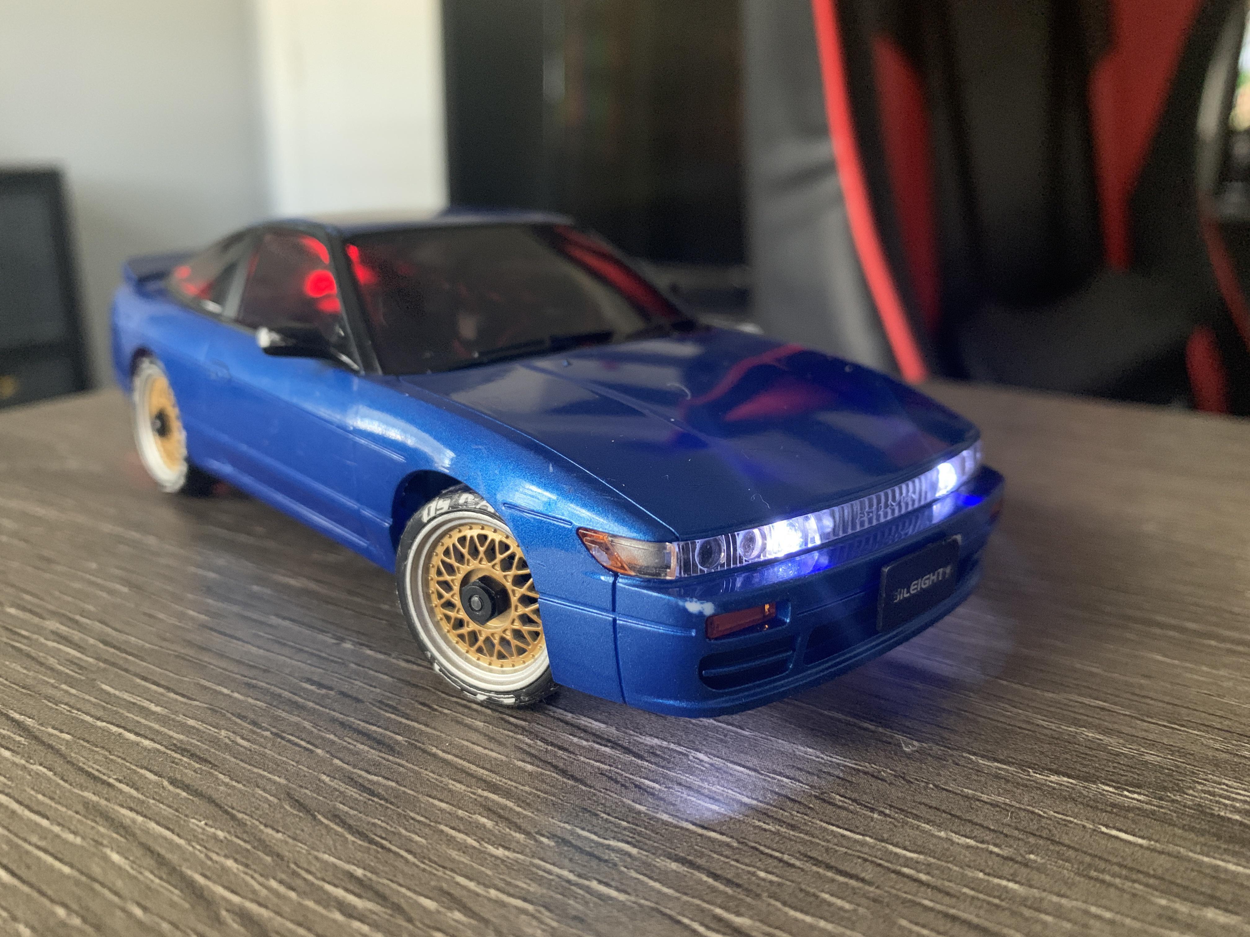 Designed a 3D printed 1/28 chassis that fits MINIZ shells. Works