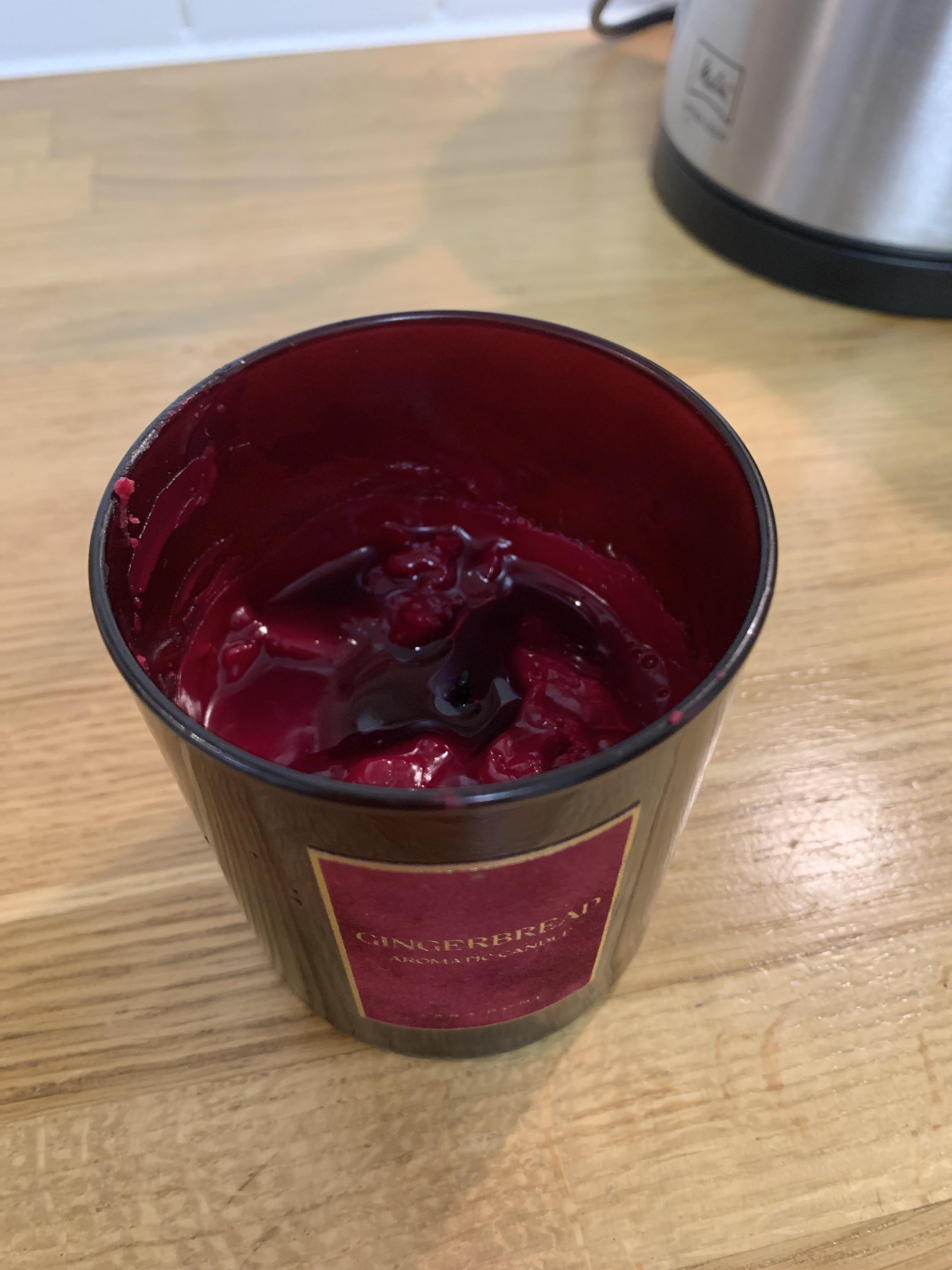 While the unmelted wax surrounding the candle is warm, I take a