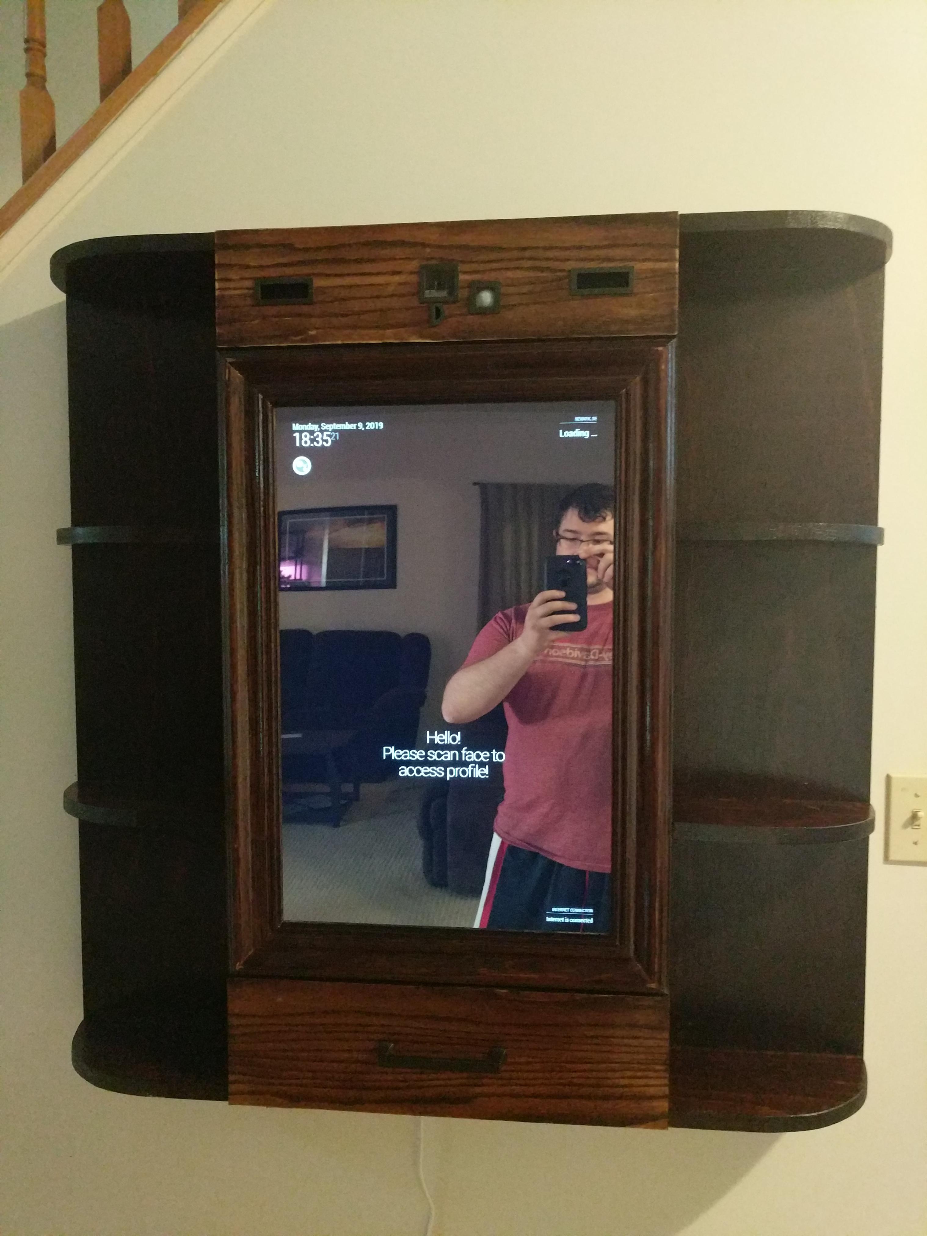 My custom Smart Mirror built around Magic Mirror 2! Frame was hand