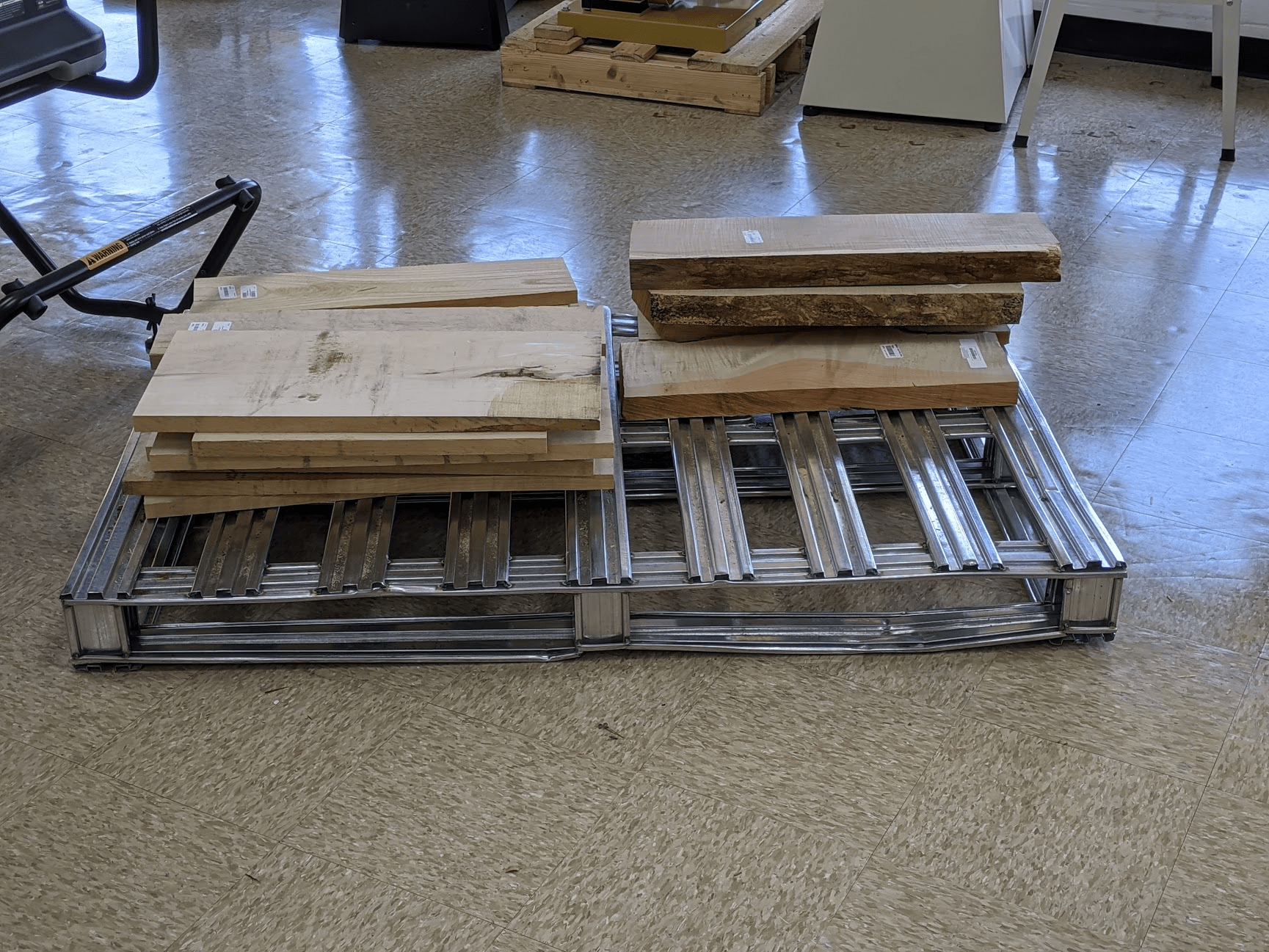 Some wood on a metal pallet mildlyinteresting