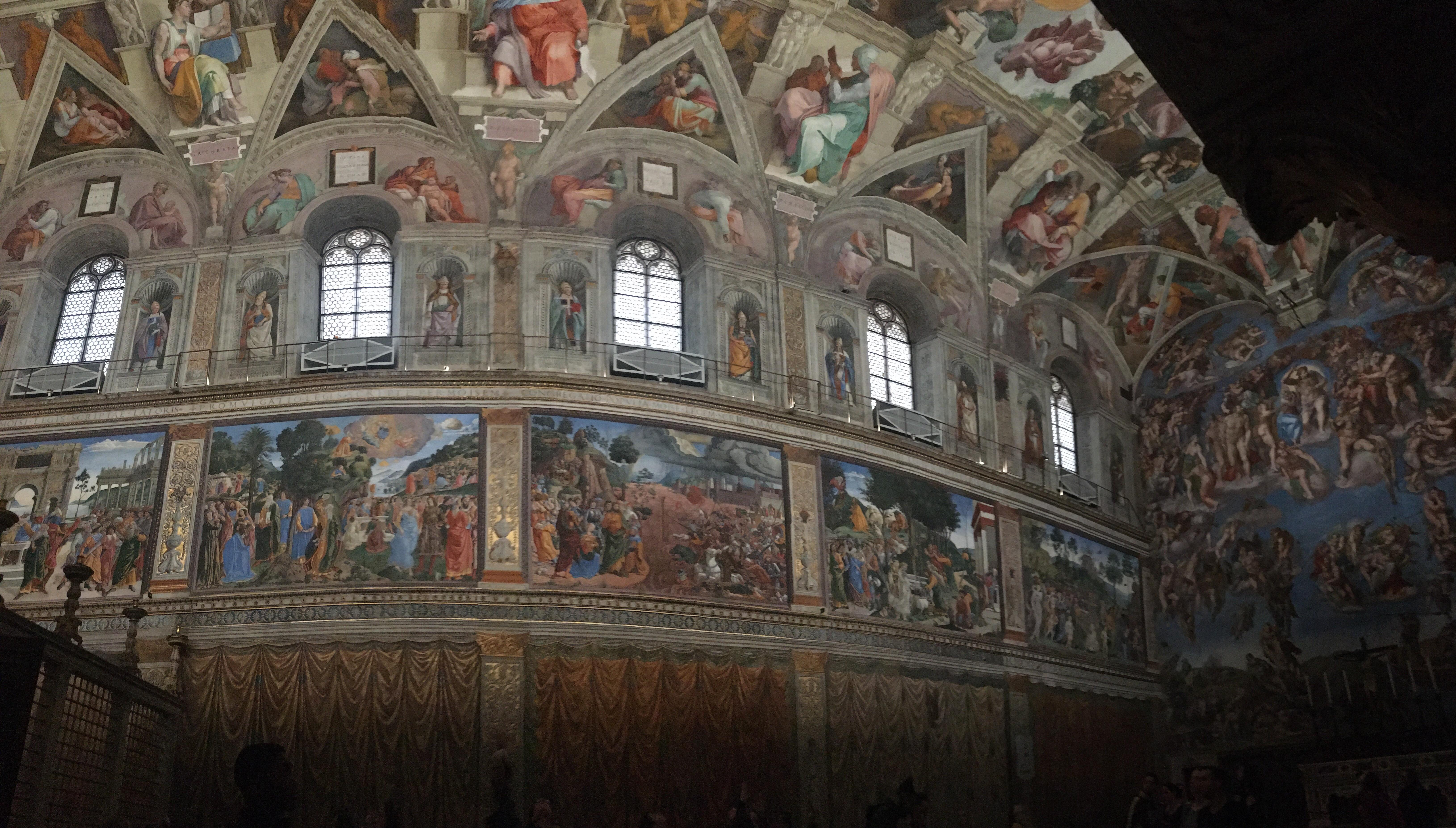 Semipanorama of the wall of the Sistine chapel in Vatican City. r