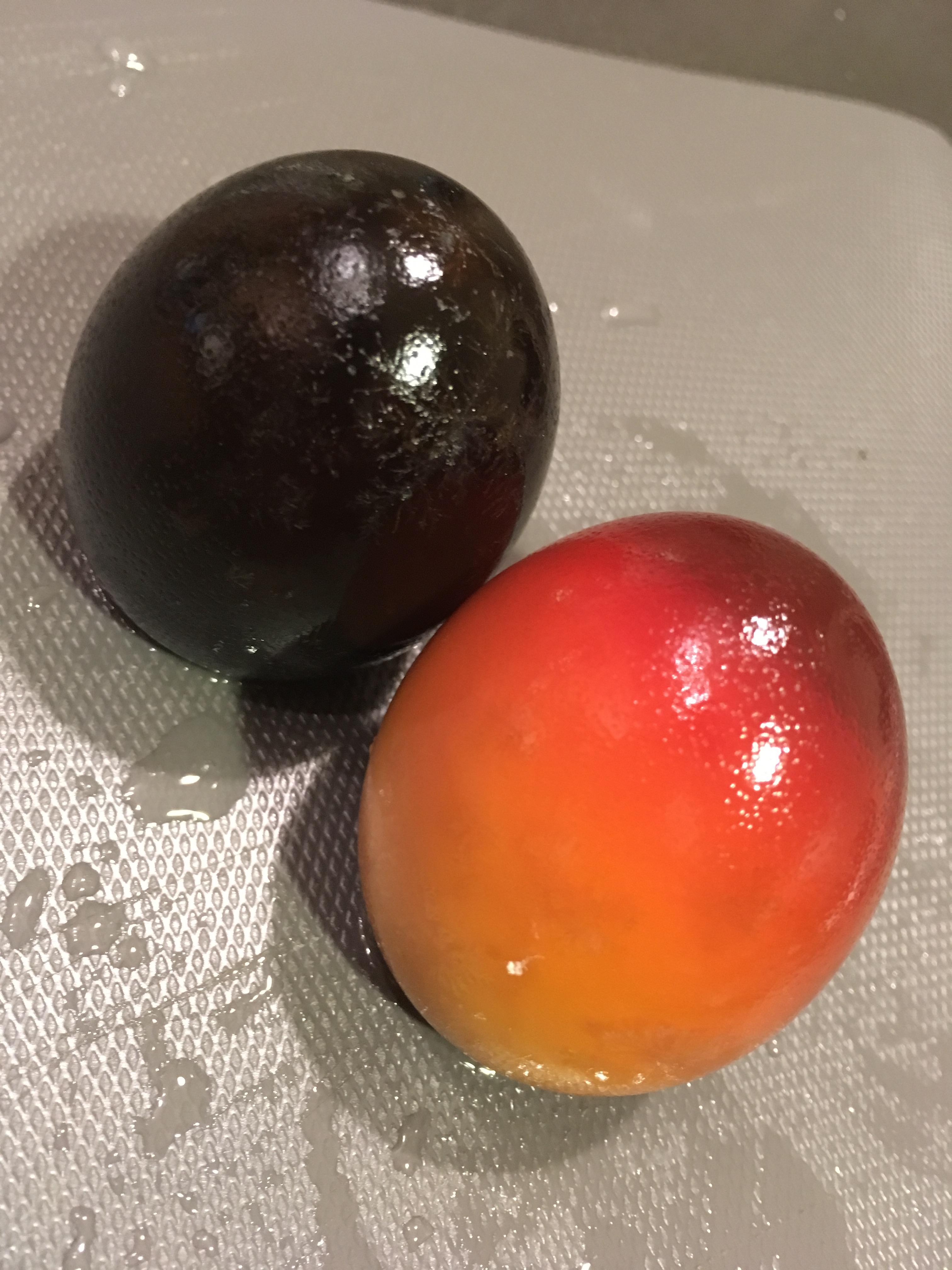 What cause the red discoloration on this century egg? asianeats