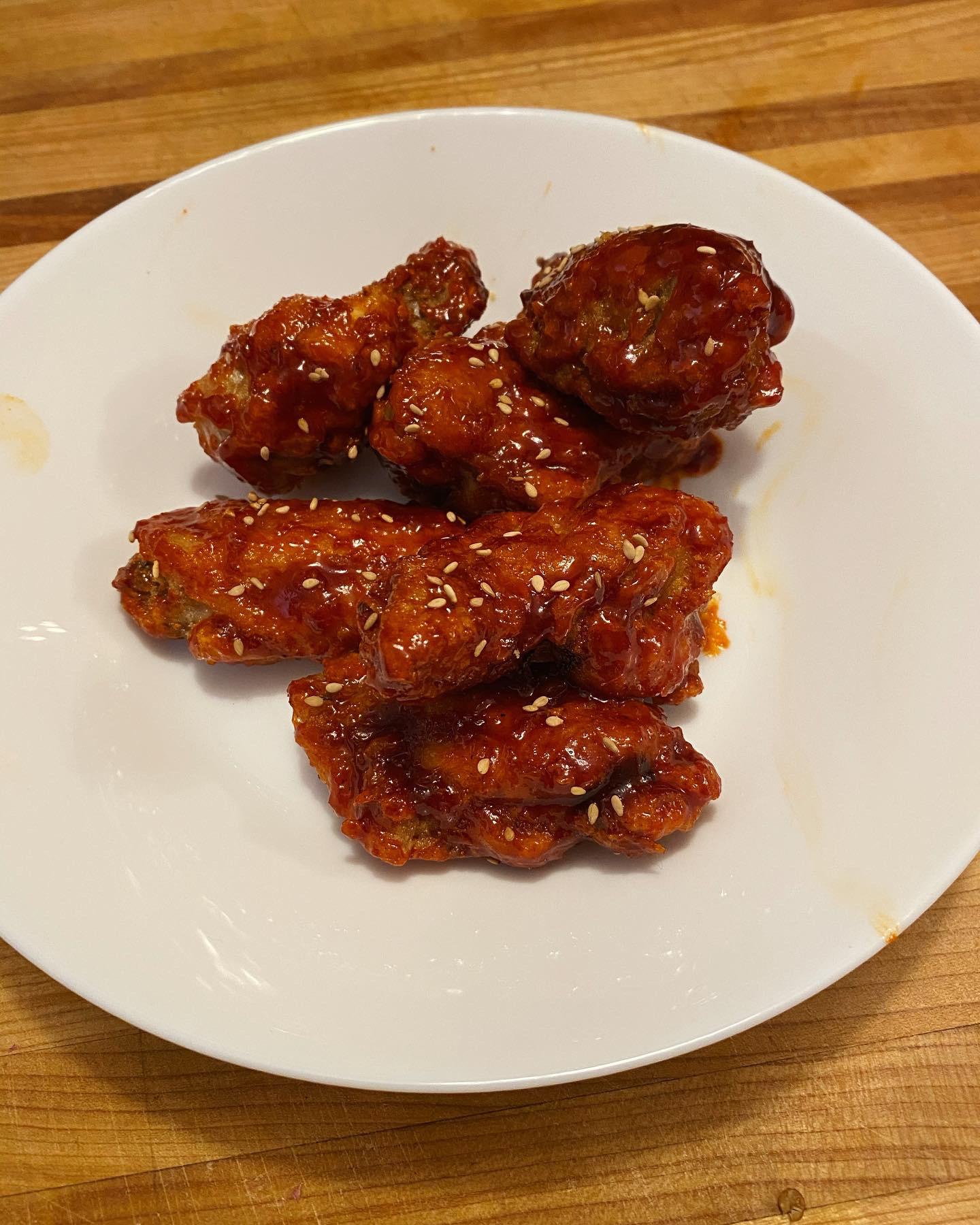 Chicken wings with homemade Korean bbq sauce and sesame seeds. I only