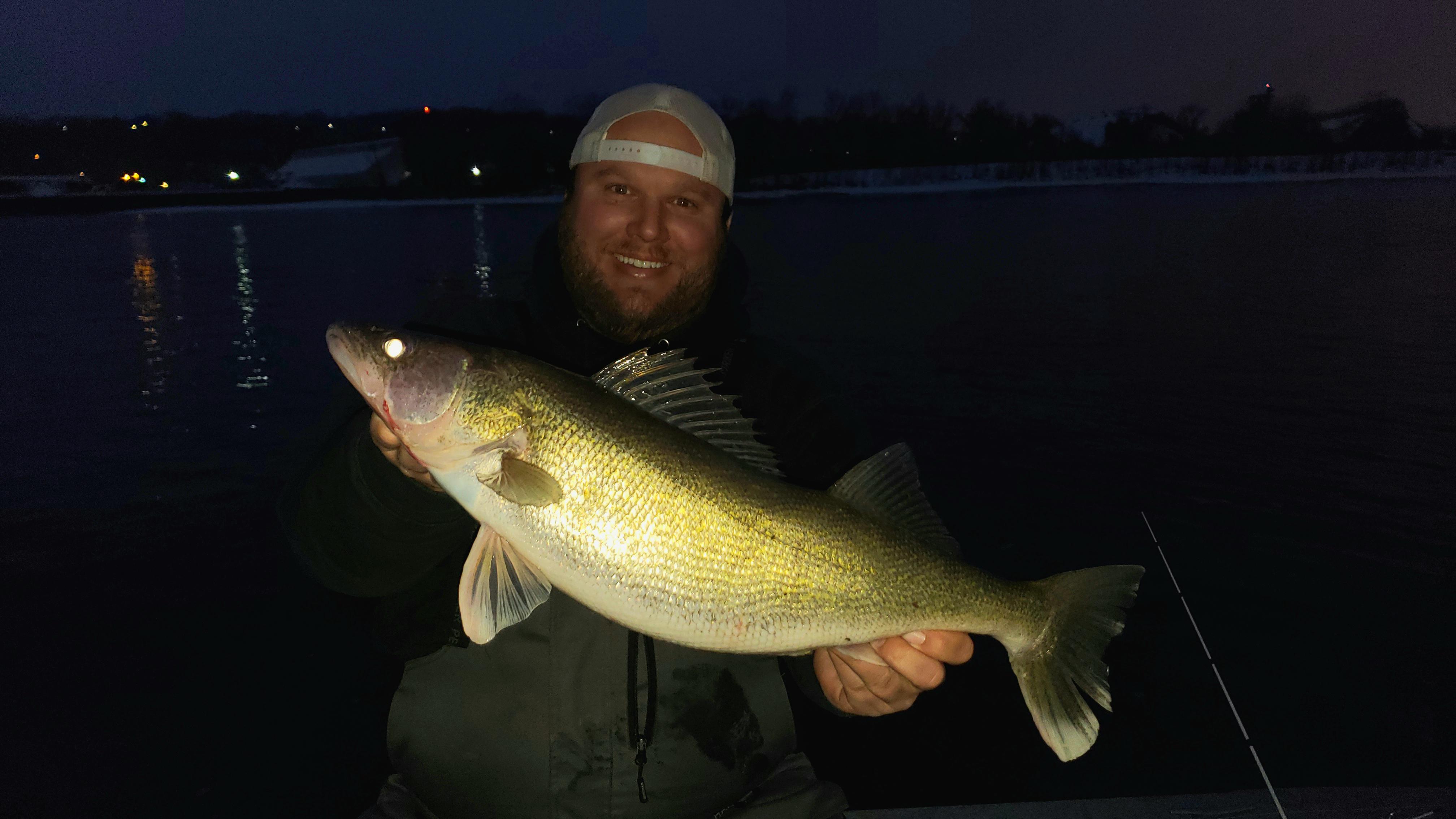 River fishing from a boat in February in Minnesota is