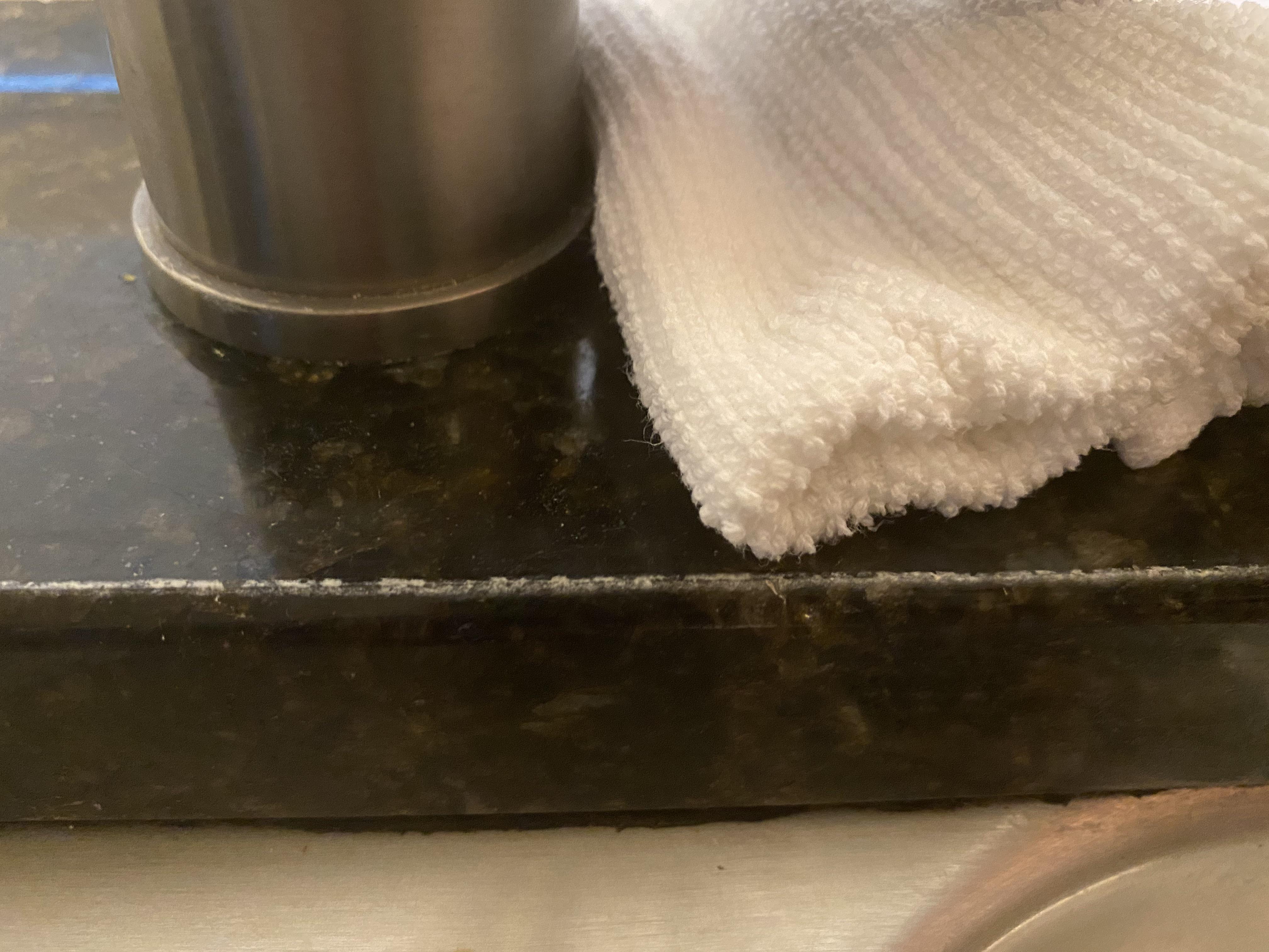 This is my kitchen sink. Any idea what this white line on the edge of