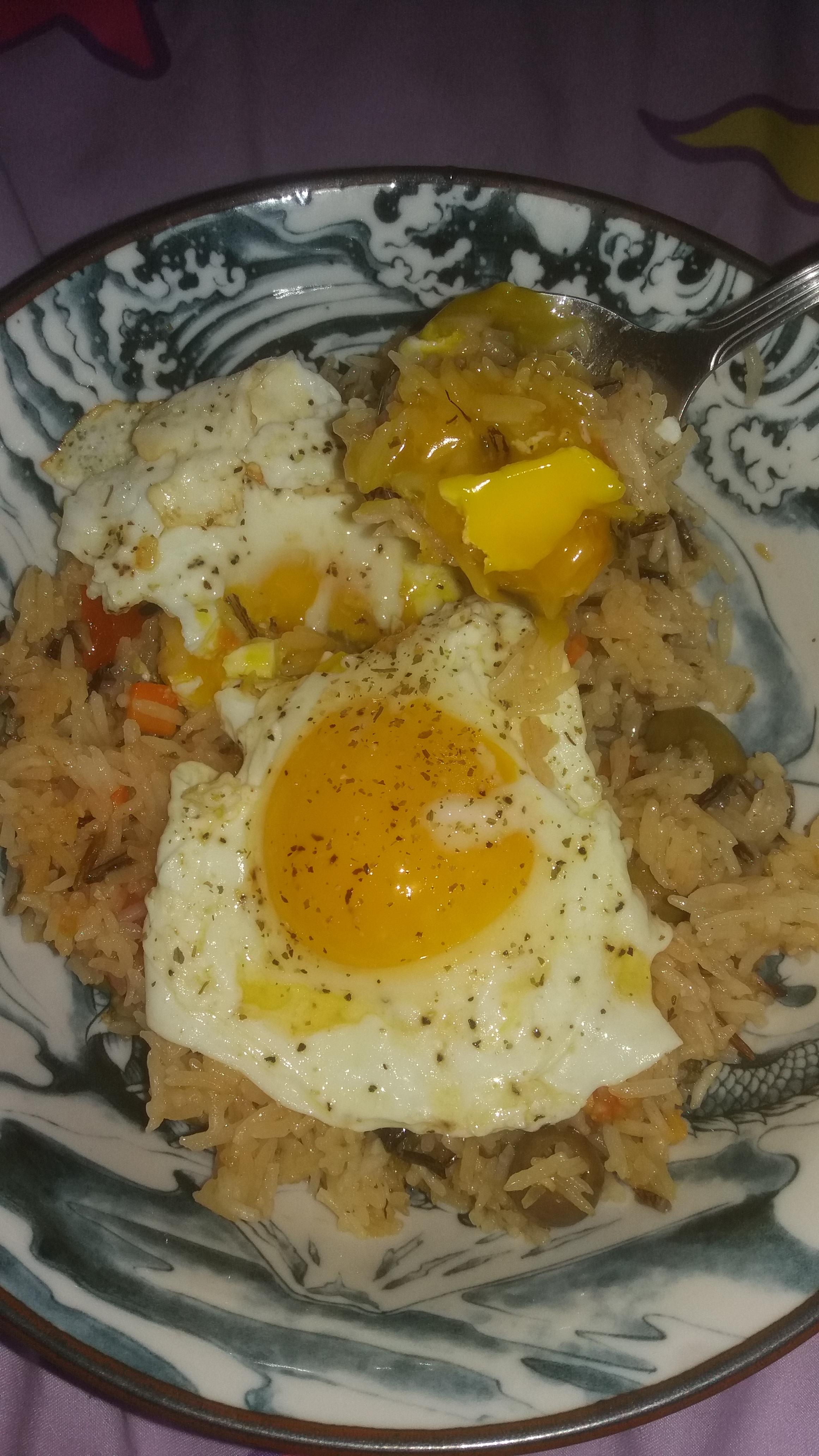 Lemon butter basmati rice with fried eggs. Featuring a very yummy yolky