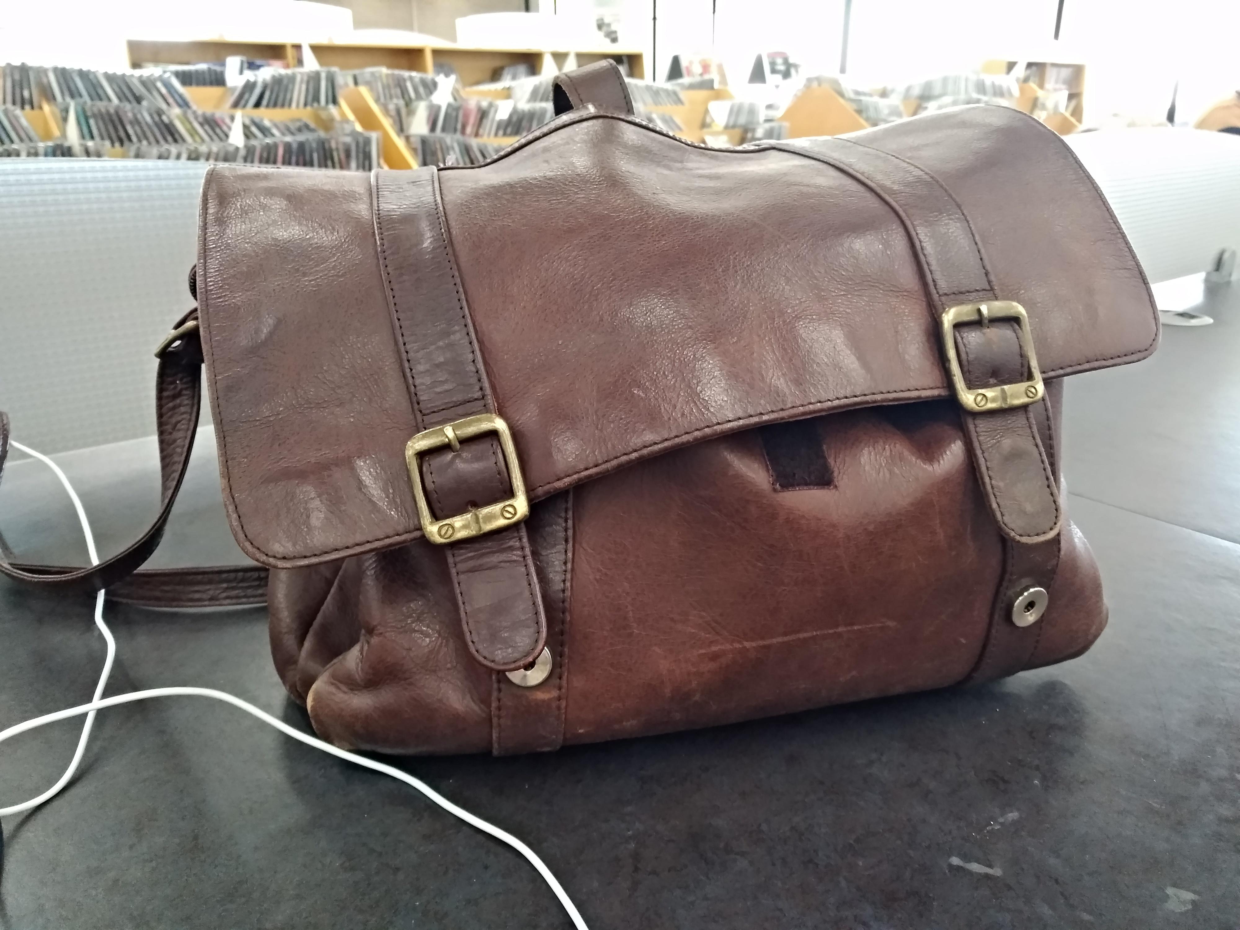 Leather bag my mom used through college and grad school in the 80's, is