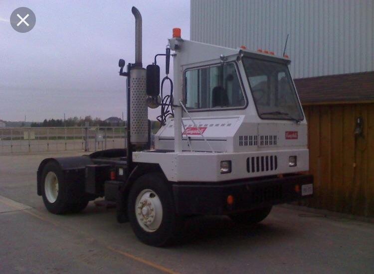 Yard dog A semi truck made entirely for moving trailers across the