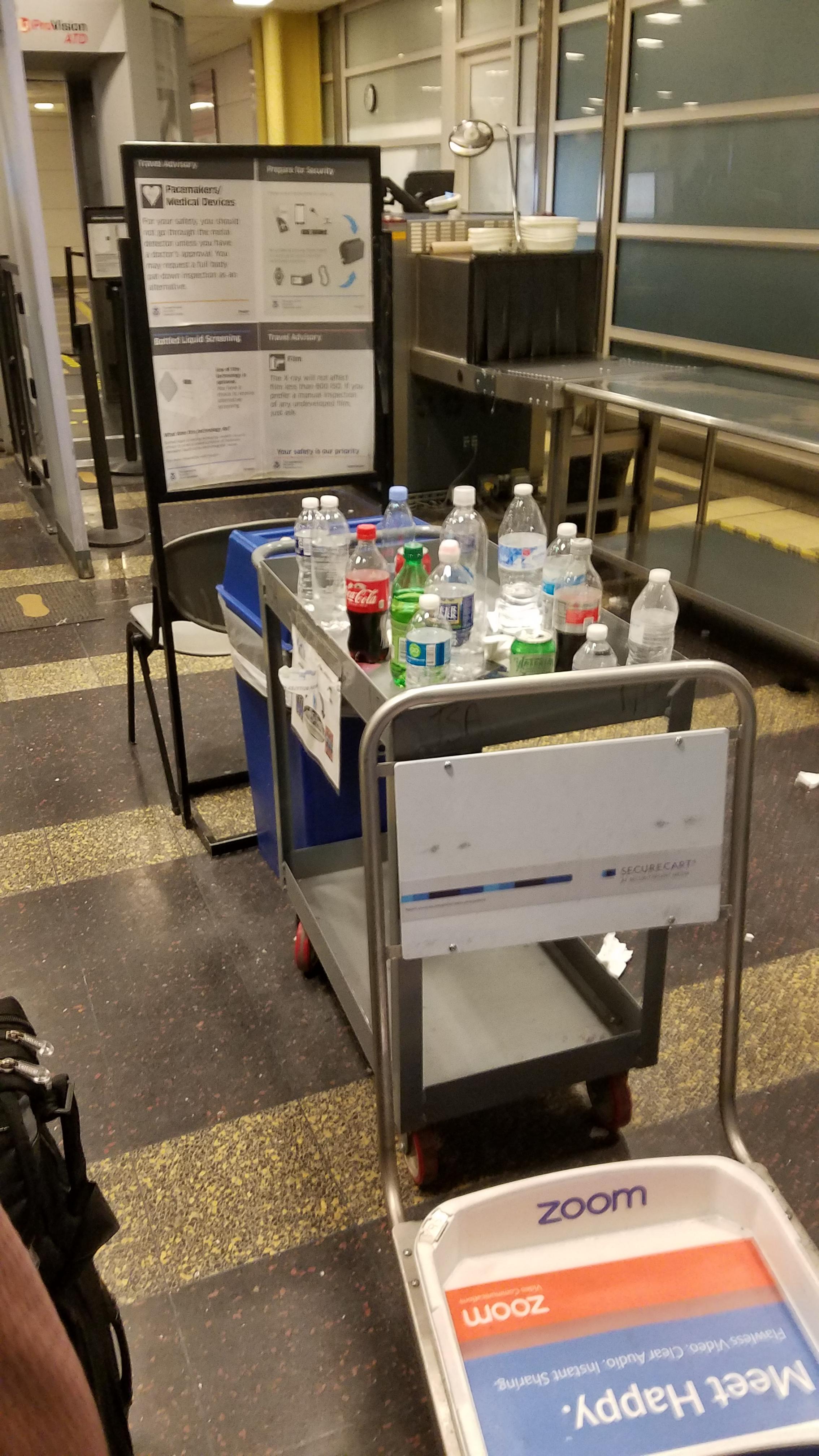The number of bottles collected at this one airport security line. r