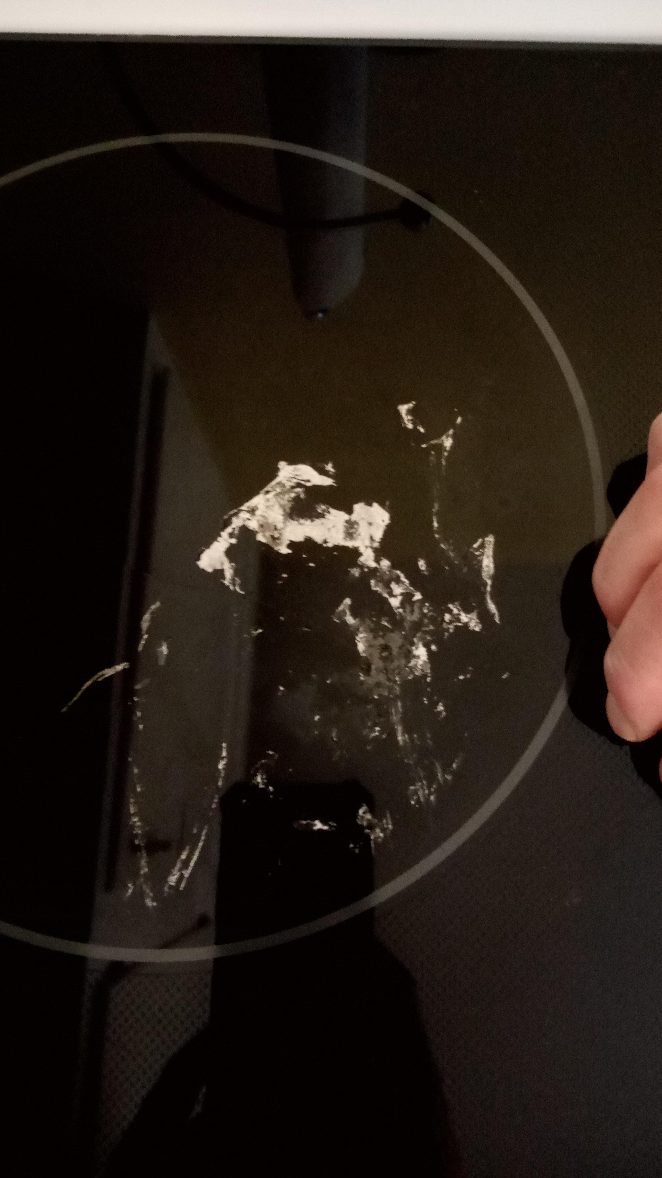 Aluminum foil burnt on, any tricks to getting this off? Razor blade is