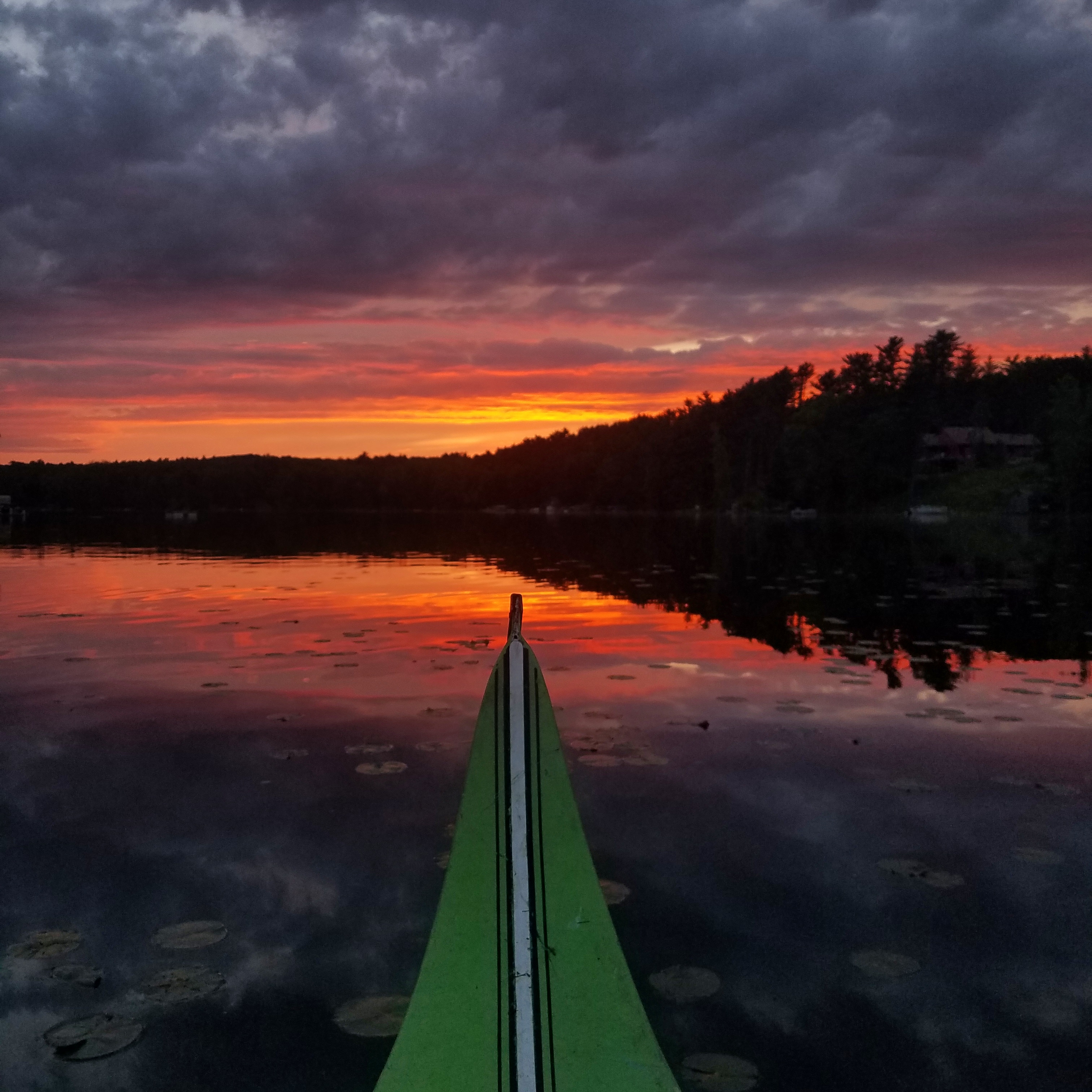 Lovely sunset view from the bow of the vintage canoe I grew up with