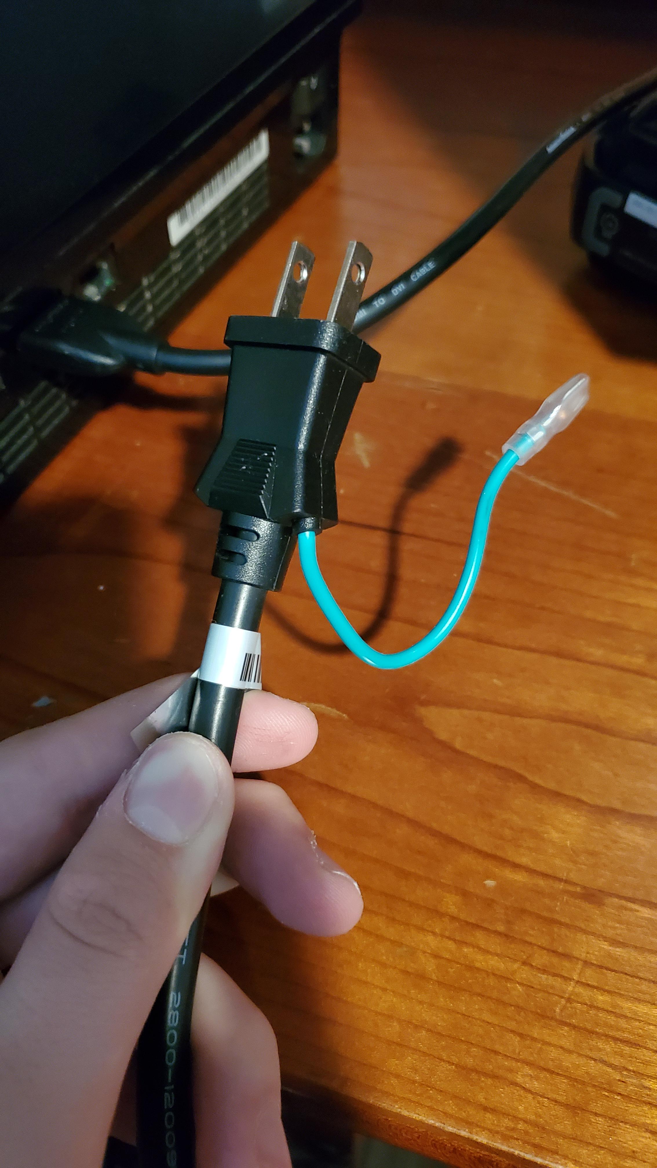 What is this green cable thing that is in the power cord that came with my ROG power supply? r