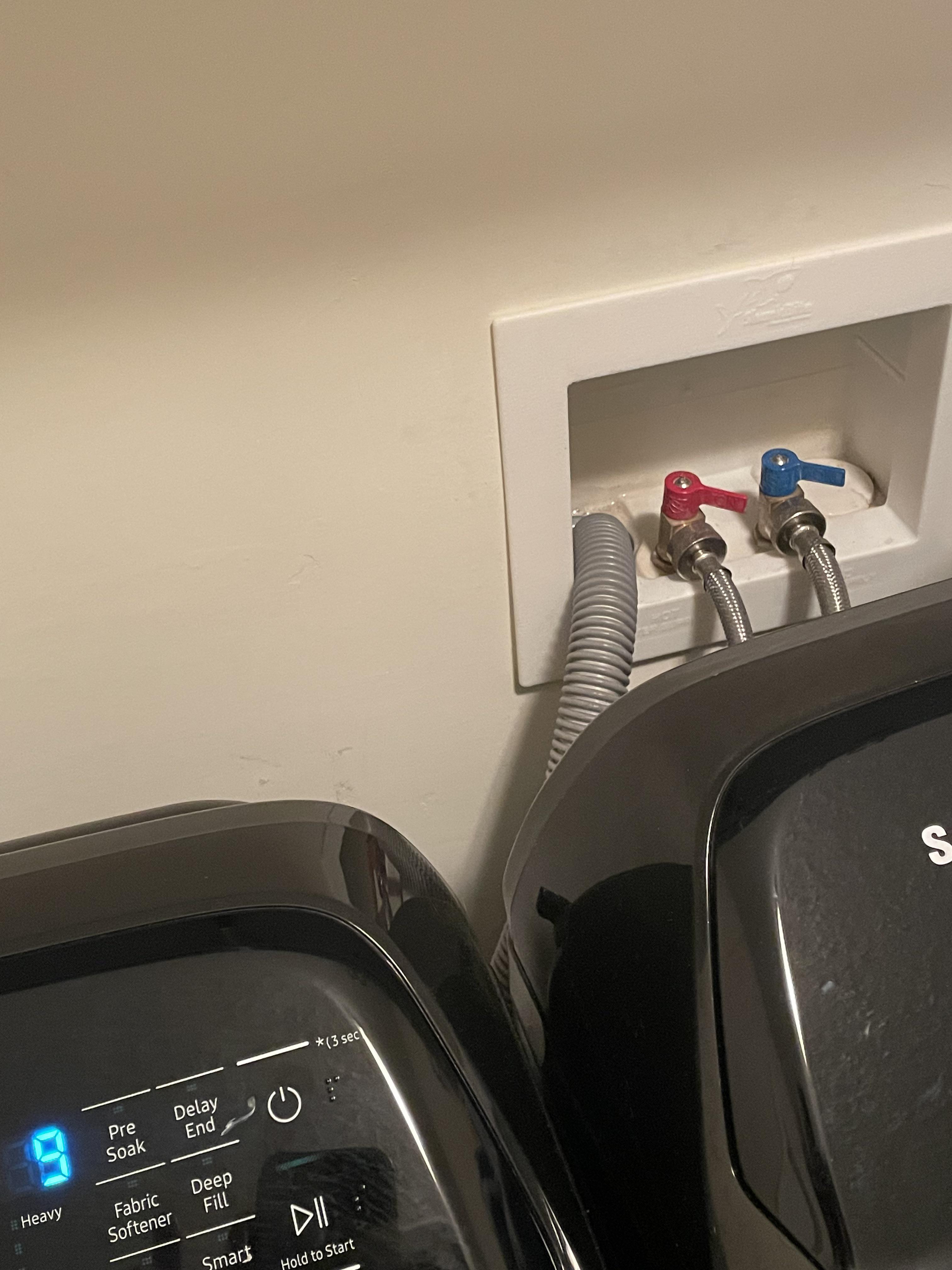 Water keeps pouring out from where washer is supposed to drain to r