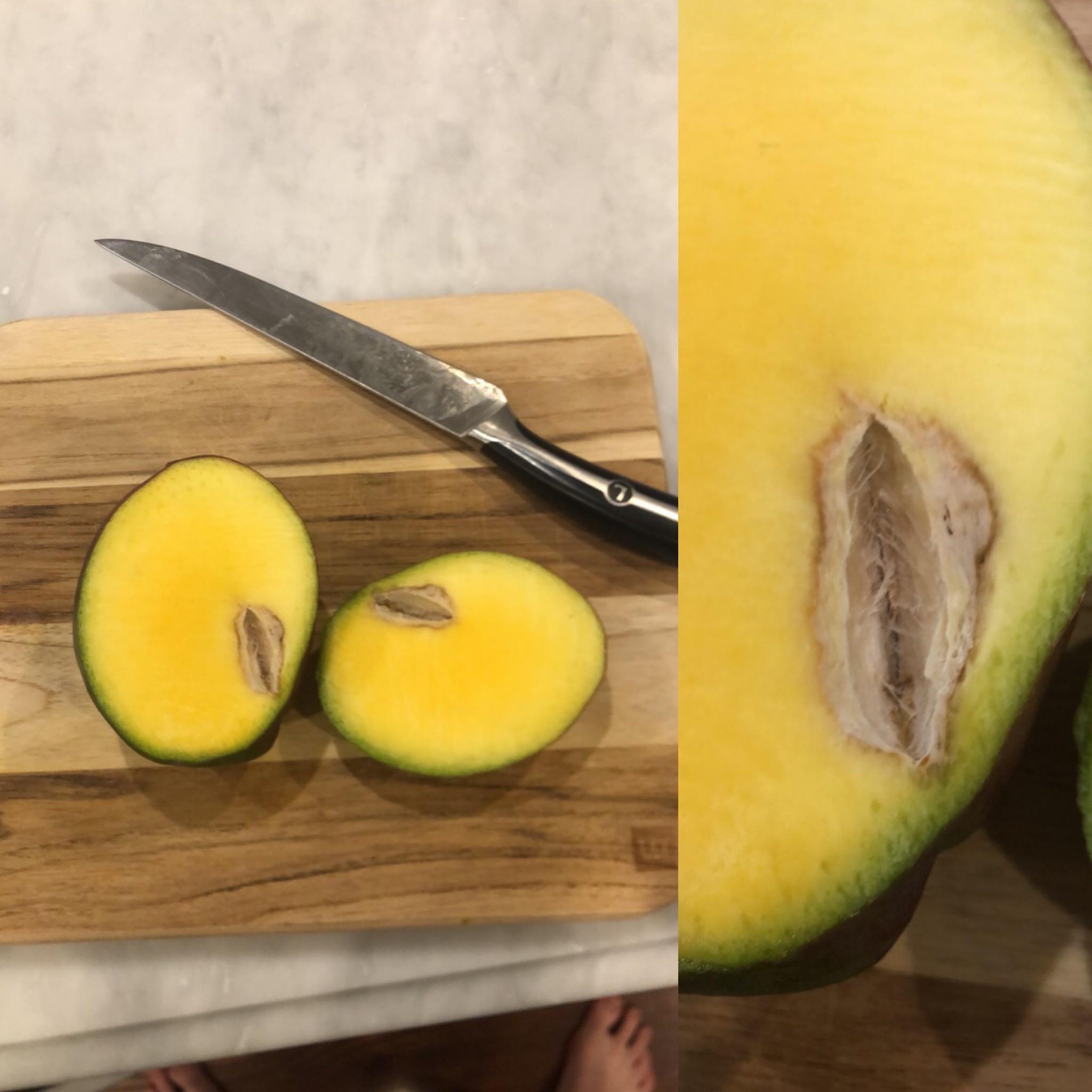 Cut open a mango and found this inside... what is it? r/whatisthisthing