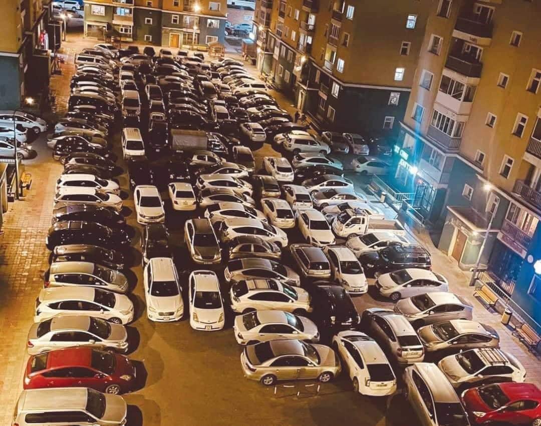 Average parking space outside apartments in Ulaanbaatar, Mongolia. r