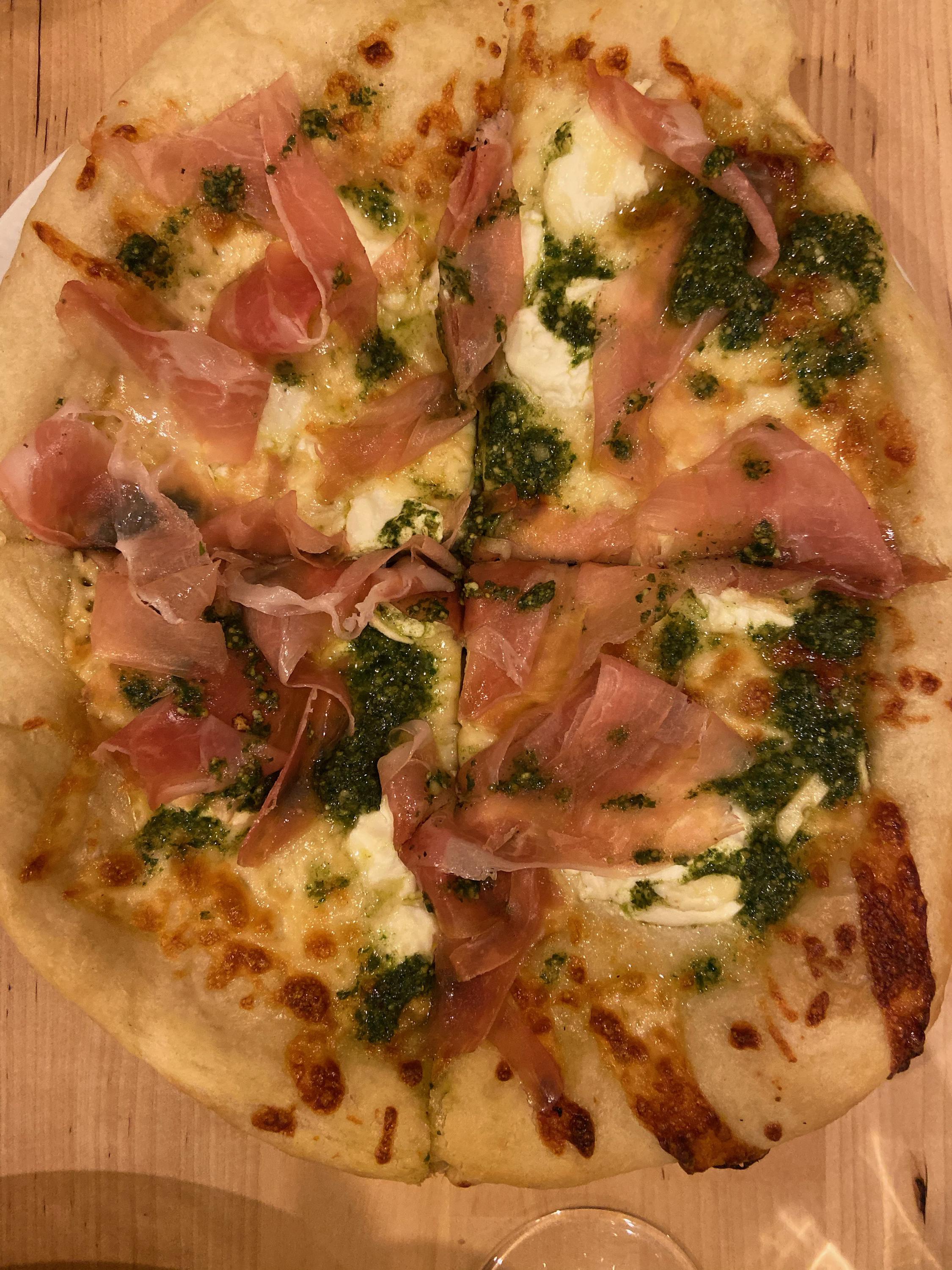 [Homemade] Pizza with ricotta, prosciutto and pesto drizzle r/food