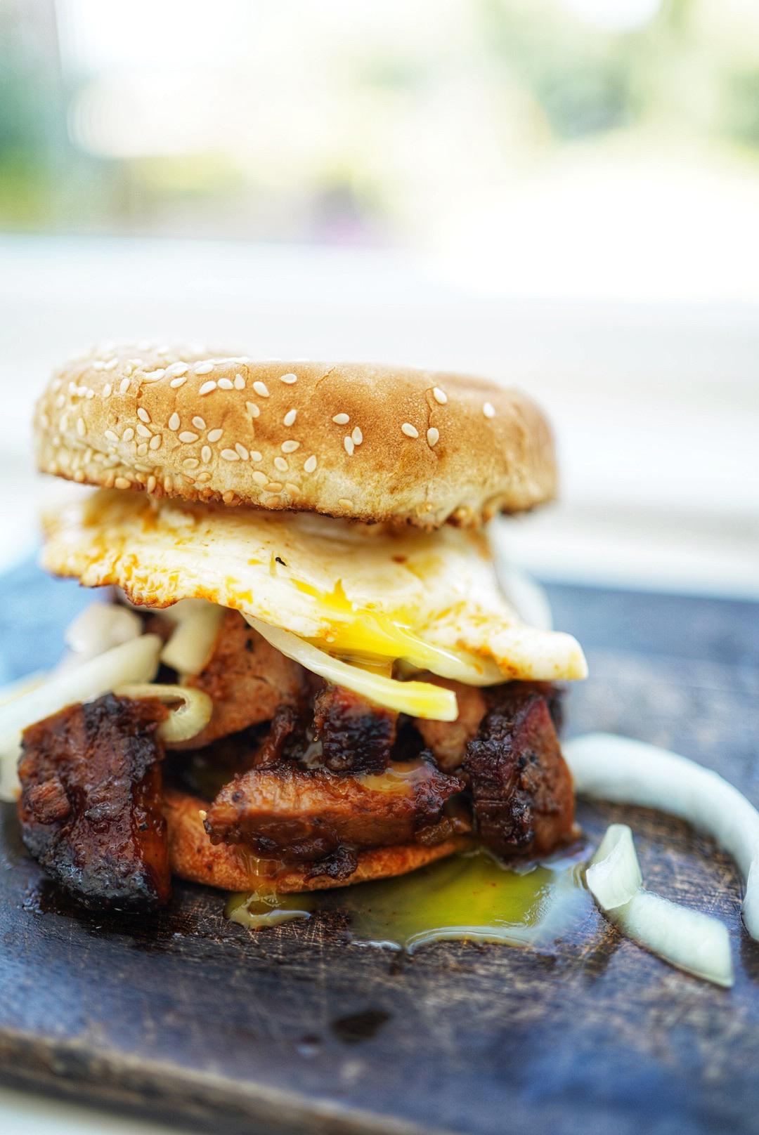 Remnants of TraegerDay Smoked Brisket Sammy w/ Housemade ‘Q Sauce + Pickled Onions + Sunny
