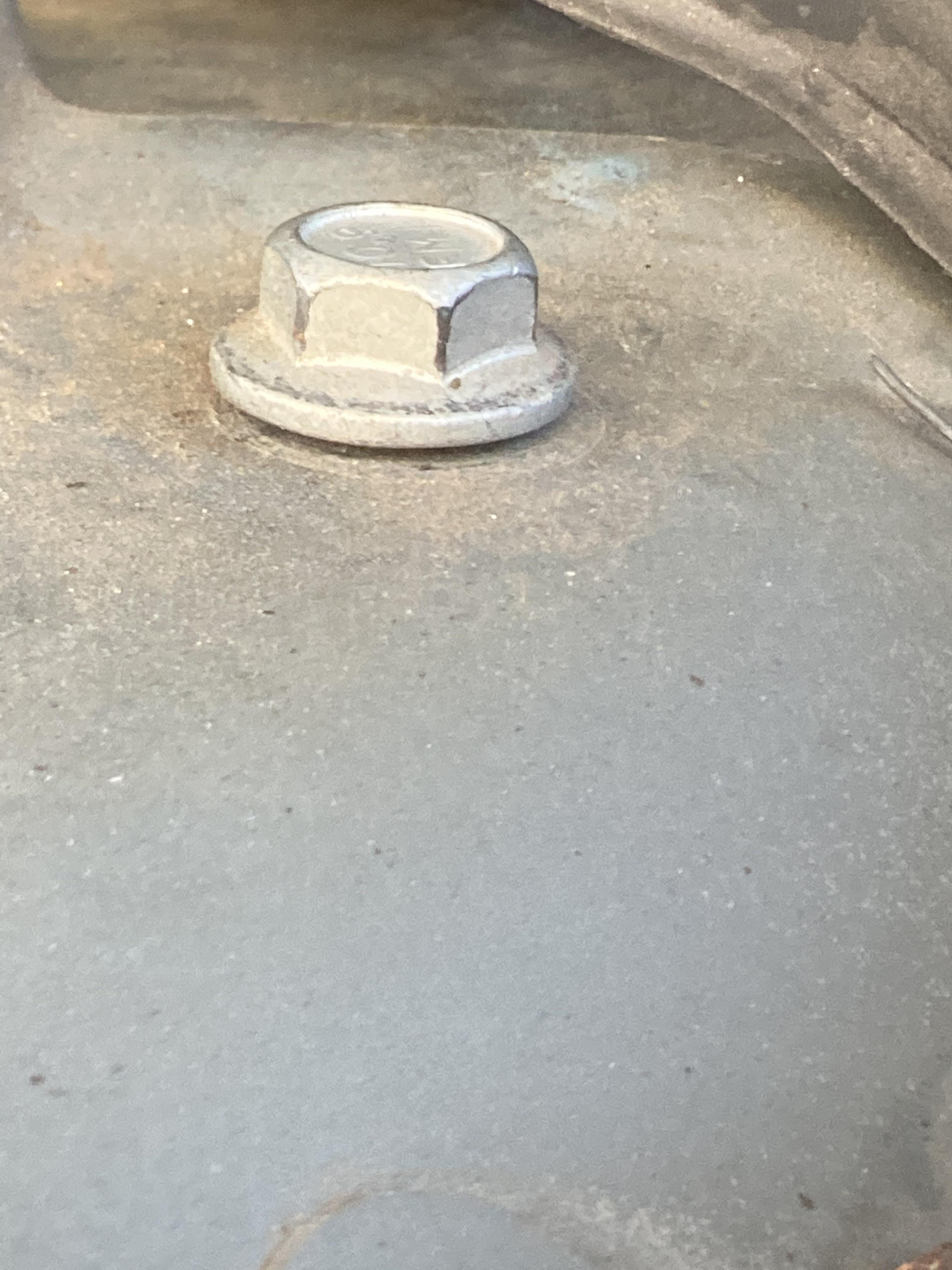 Should I tighten this down? Strut mount bolt. Found it like this a year