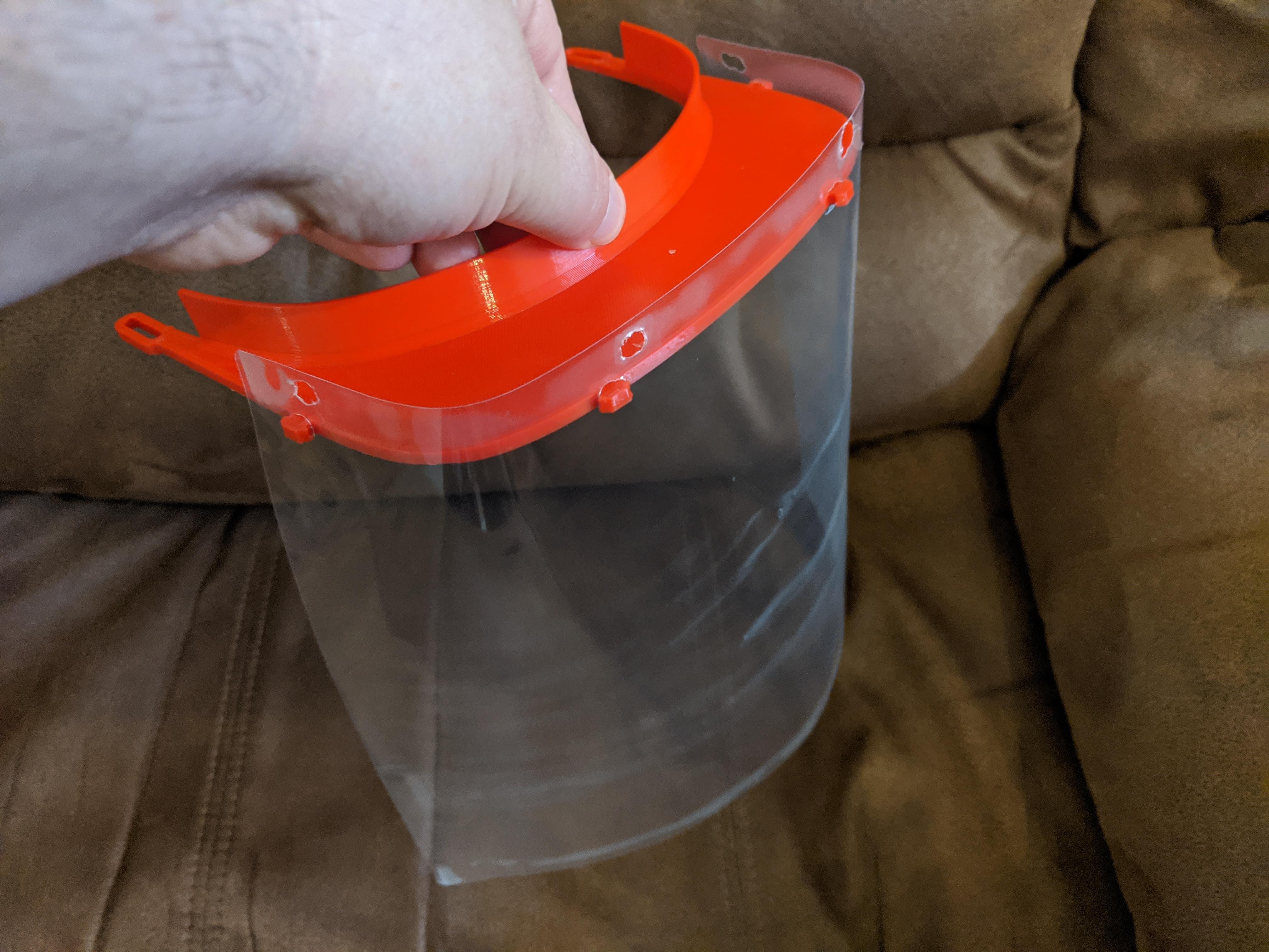 I was able to use a laminate pouch to create the clear plastic for the