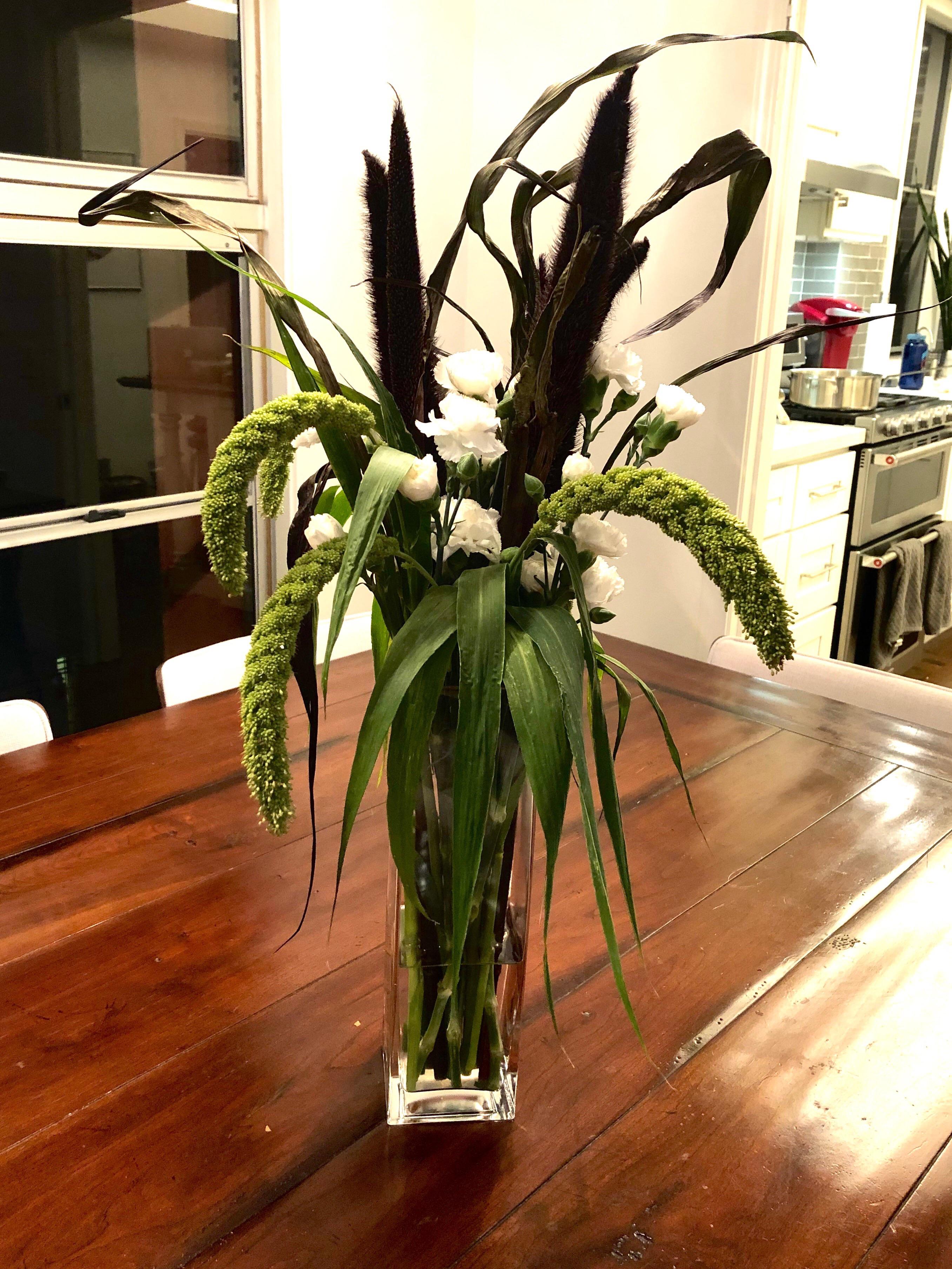 Made a ghostly little arrangement with Trader Joe’s flowers. I’ve never