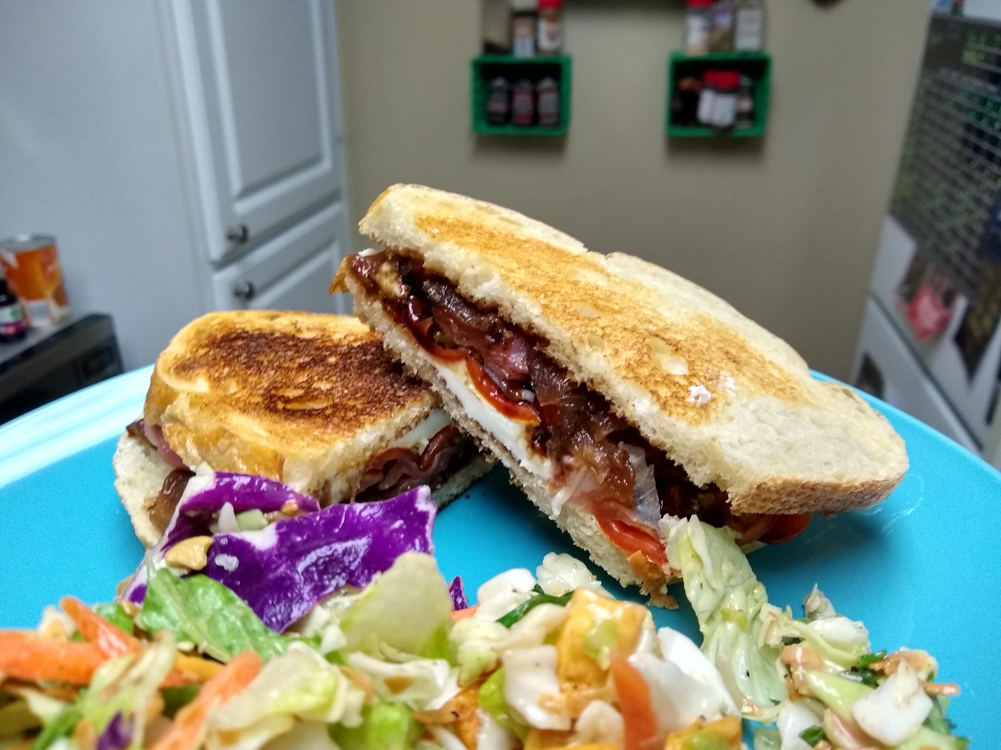 Goat cheese, Parma ham, tomato, and onion jam on sourdough. So