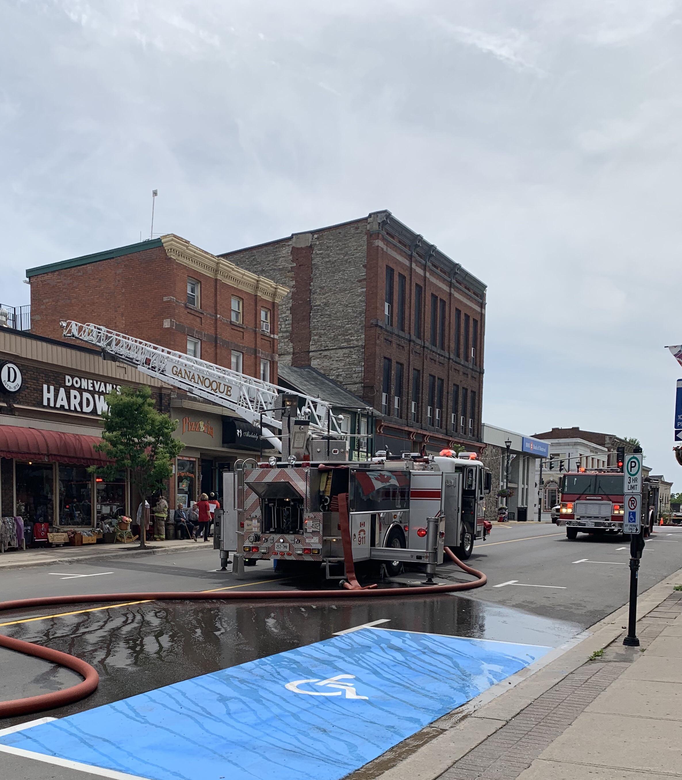 Gananoque Fire Department’s Ladder 2 up for a rescue during a garbage