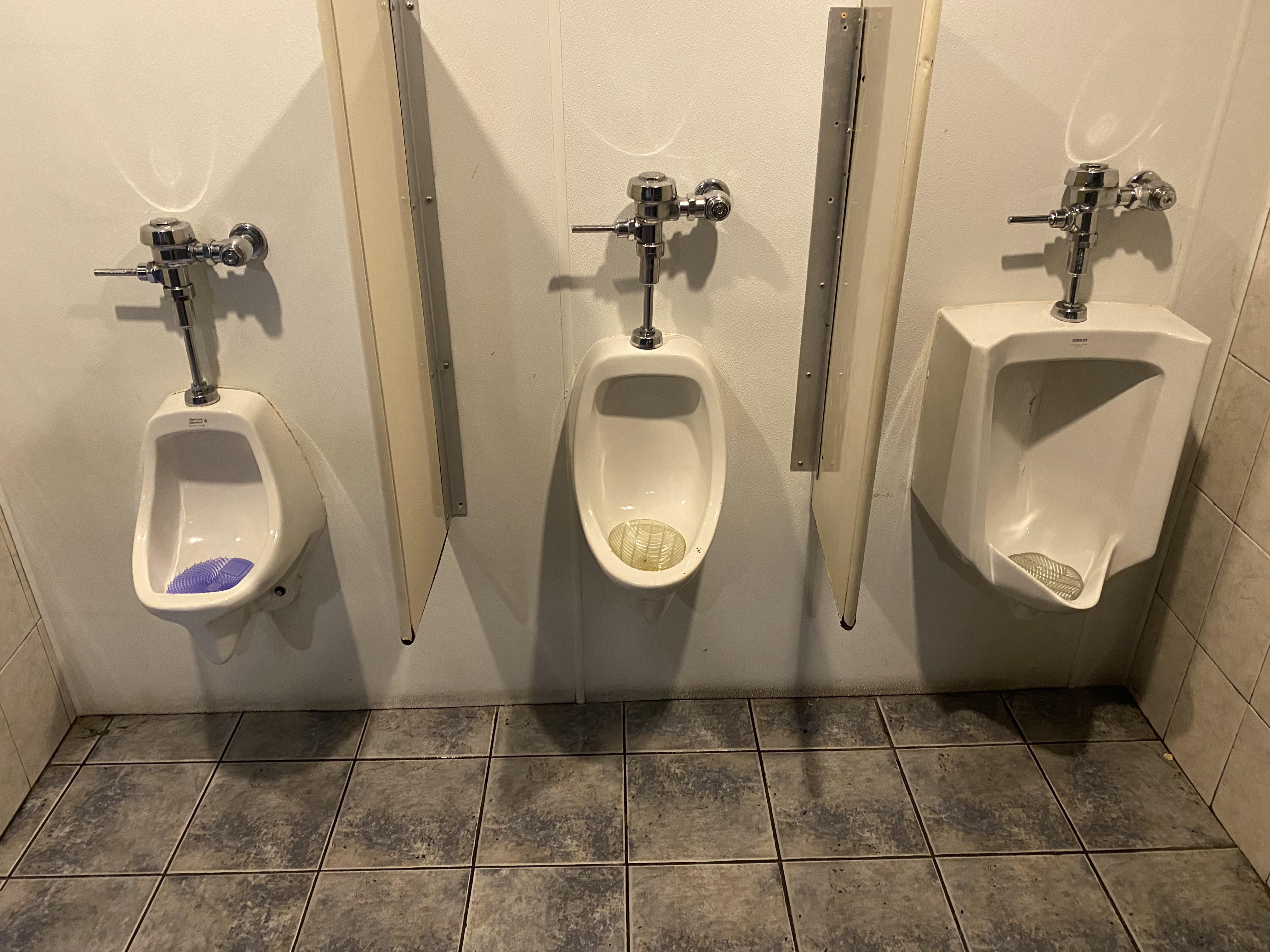 This bar I went to had three distinctly different urinals. r