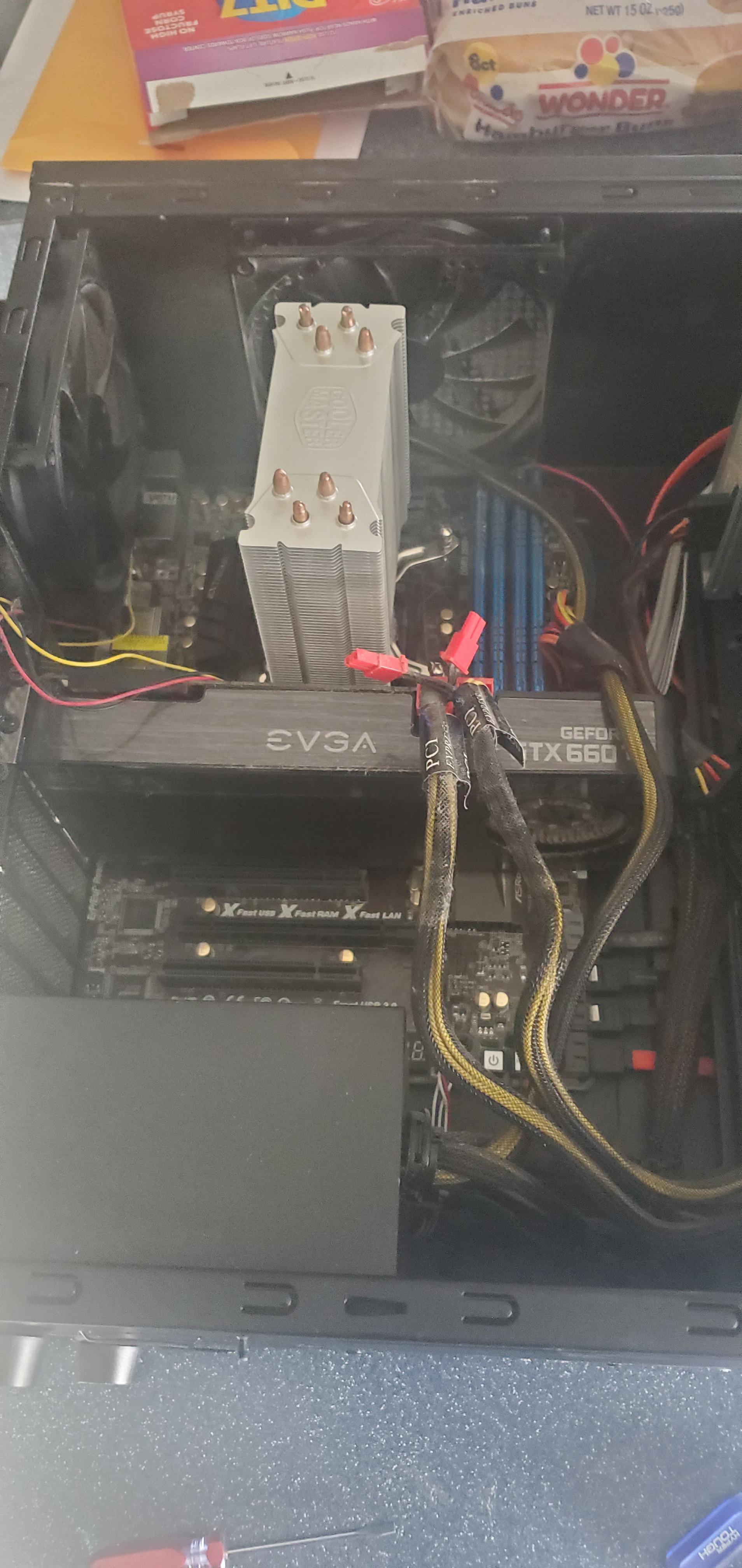 CPU cooler won't screw in. Do I need to remove the motherboard then