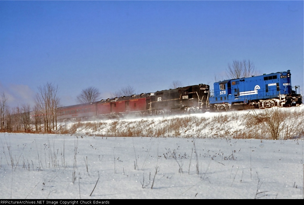 Conrail GP7s 5711 and 5792 are northbound through Stittville with an