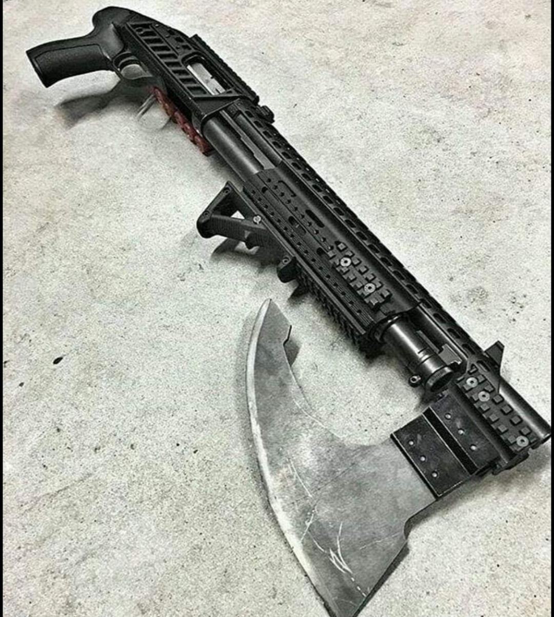 Ah yes, a shotgun with an axe as a Very practical indeed. r