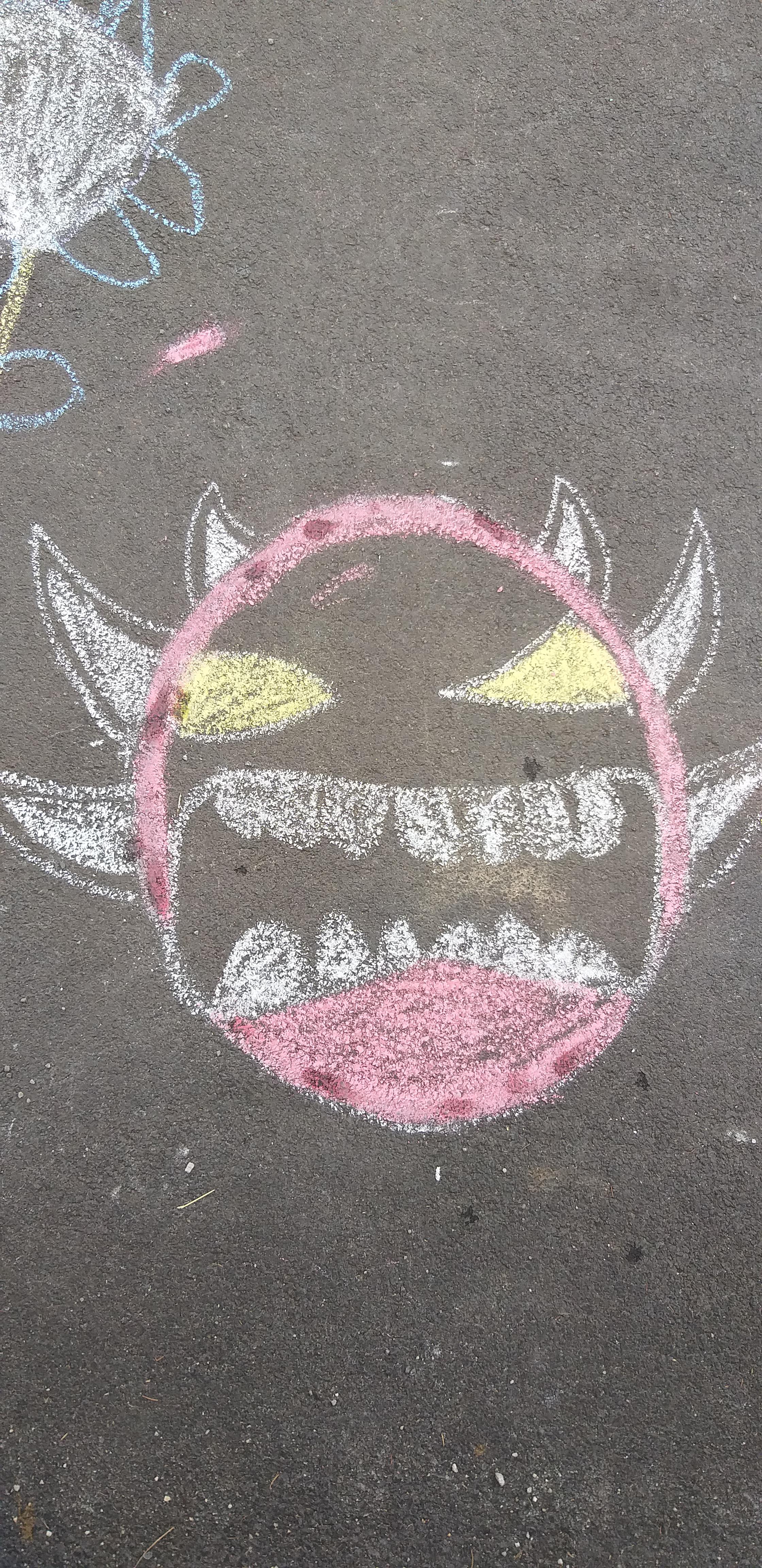 Some kid started drawing extreme demon face with chalk in my street r