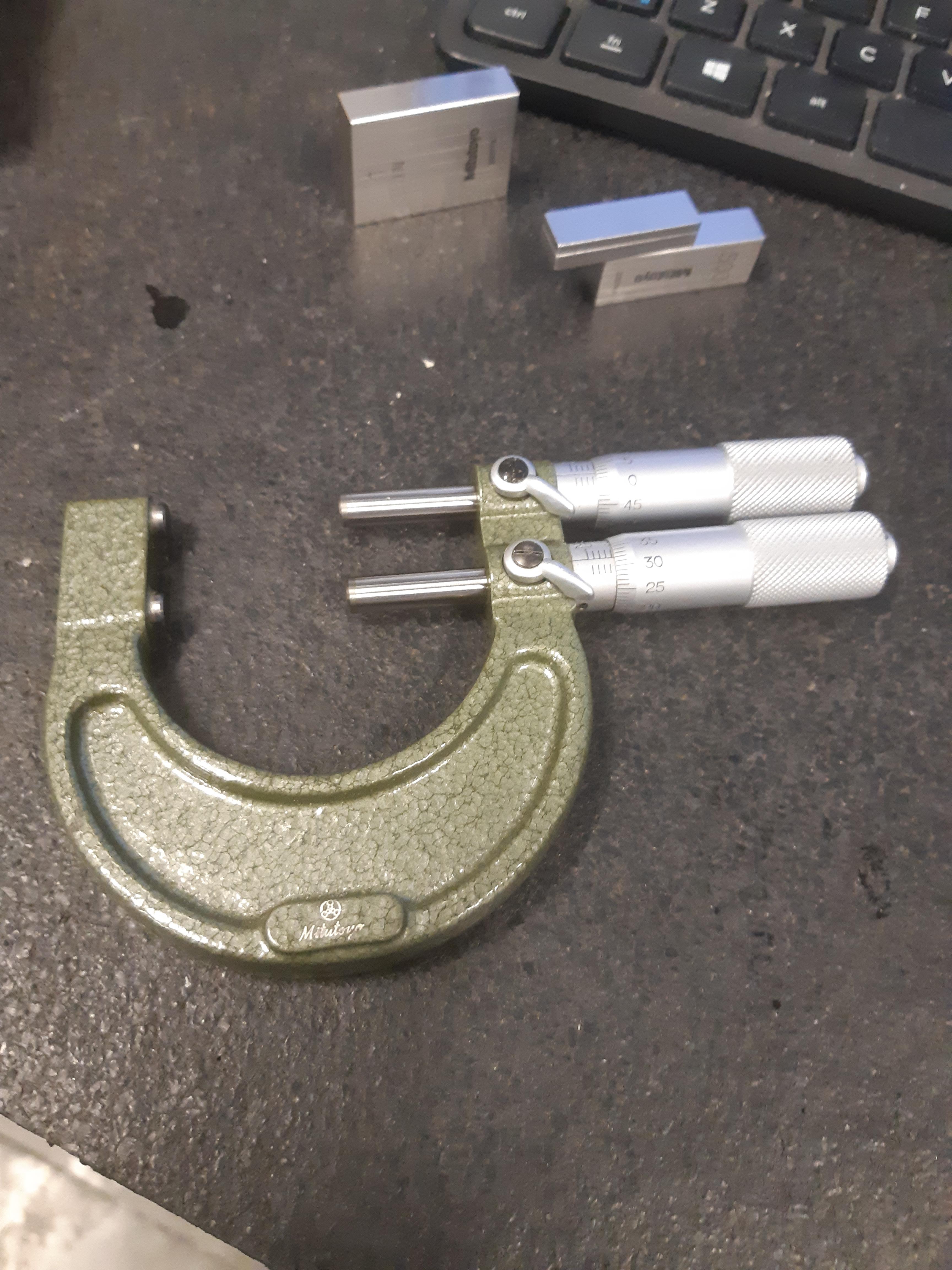 Double Barrel Micrometer Now you can measure two things at once! r